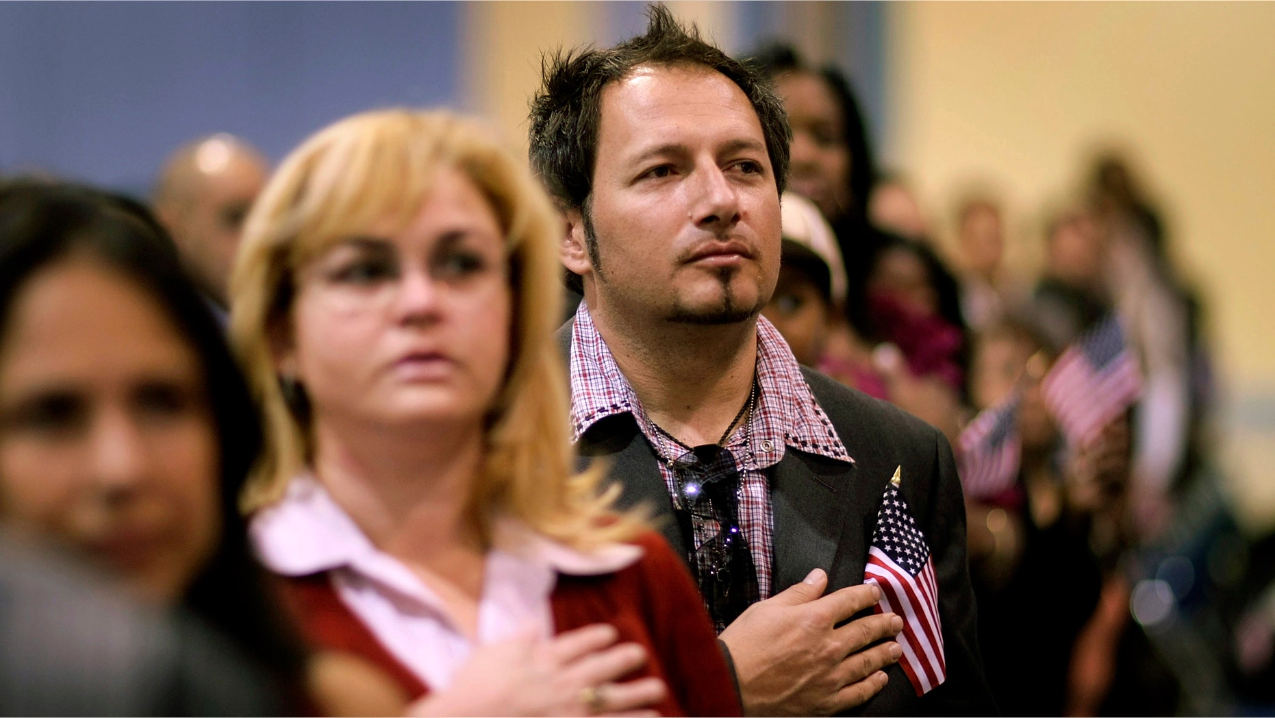 A naturalization ceremony in Miami. (Photo by Joe Raedle/Getty Images)