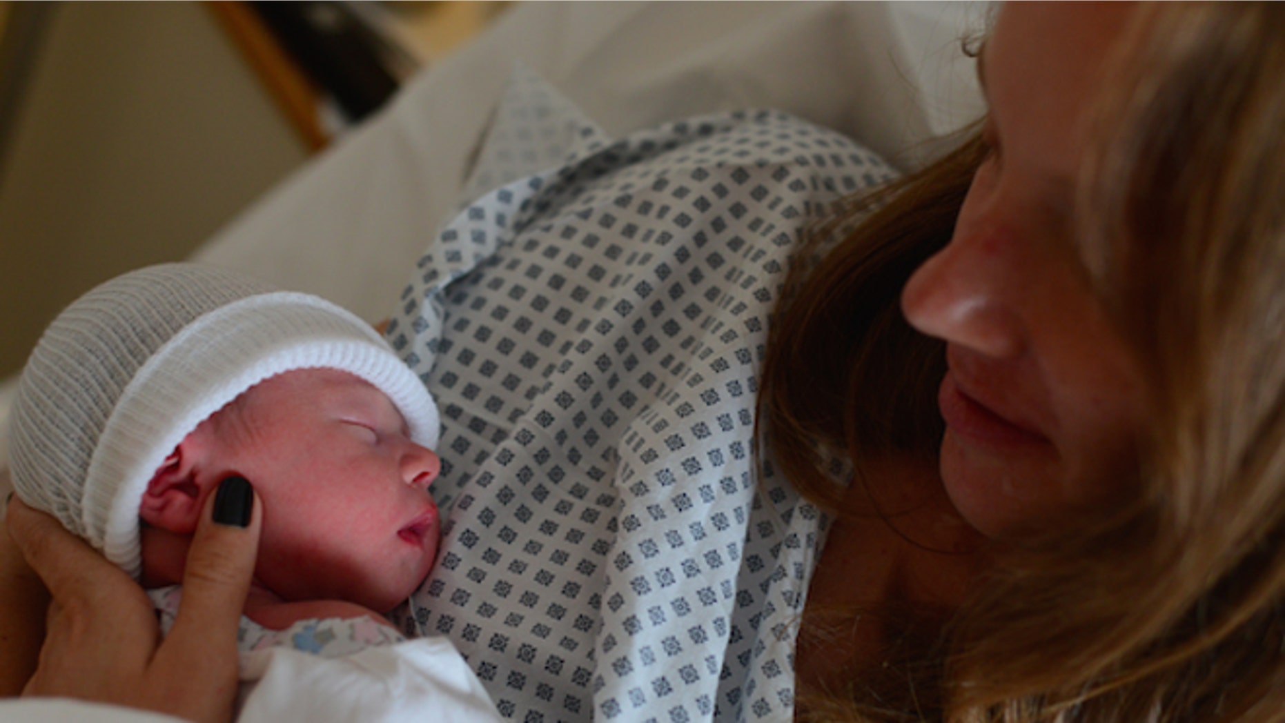 Claire Diaz-Ortiz and her newborn daughter Lucia.