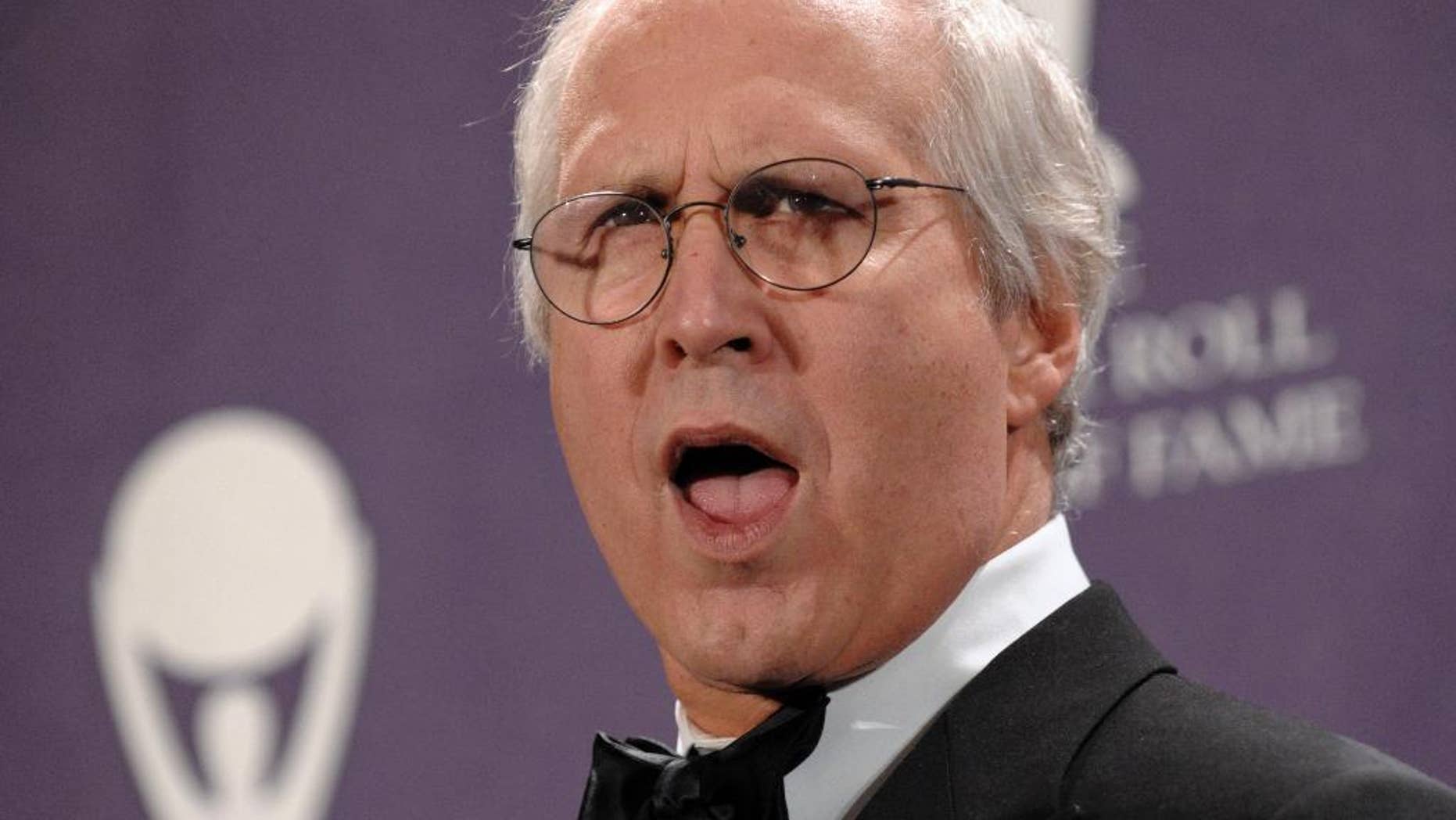 FILE - In this March 10, 2008, file photo, actor Chevy Chase poses