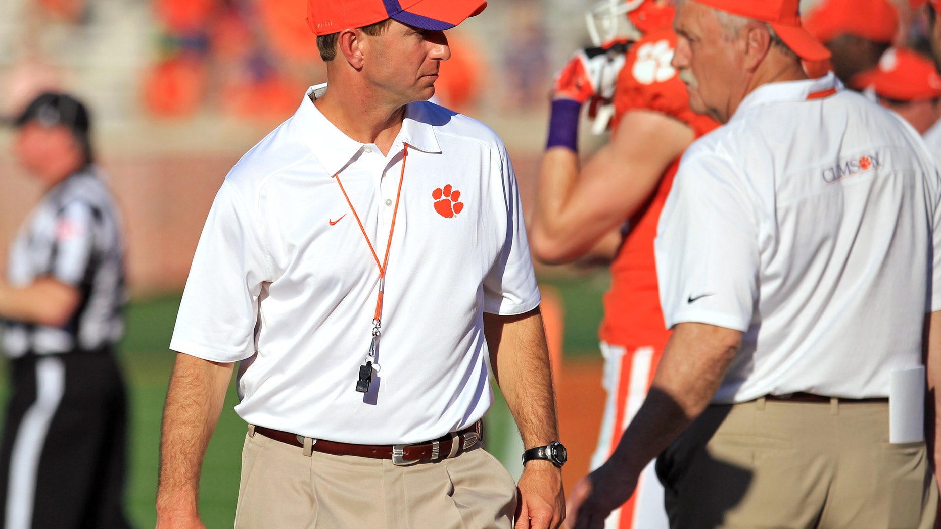 April 12, 2014: Clemson coach Dabo Swinney walks the sideline during the NCAA college football team's spring game at Memorial Stadium in Clemson, S.C. University officials deny claims that Christianity is "interwoven" into Swinney's program. (AP/Anderson Independent-Mail, Mark Crammer)