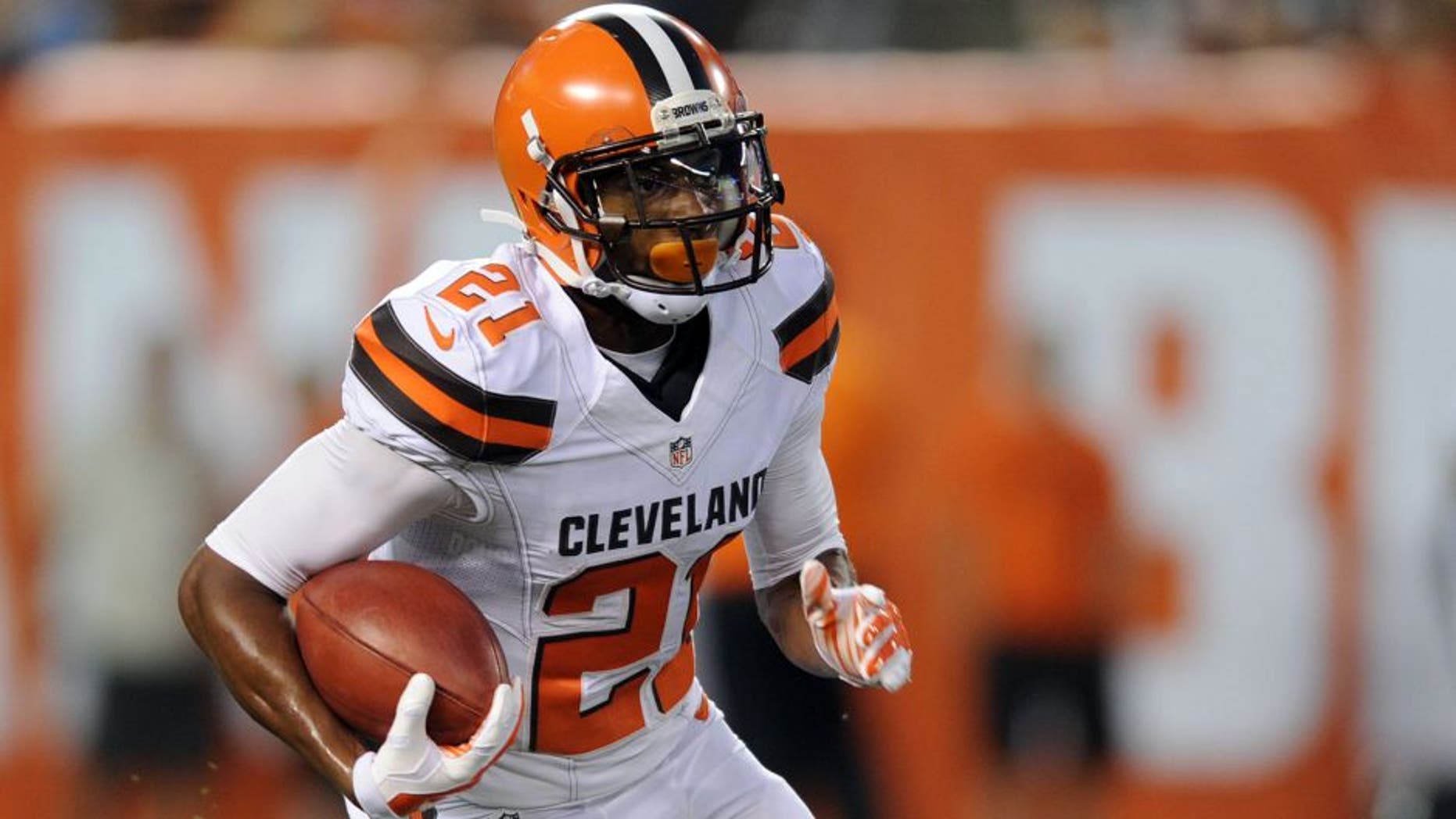 Aug 13, 2015; Cleveland, OH, USA; Cleveland Browns cornerback Justin Gilbert (21) runs back a kickoff during the first half against the Washington Redskins in a preseason NFL football game at FirstEnergy Stadium. Mandatory Credit: Ken Blaze-USA TODAY Sports