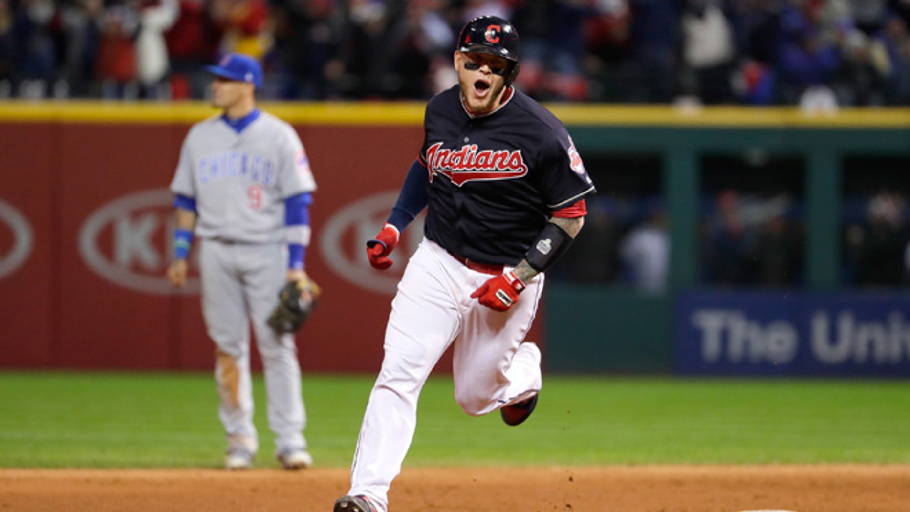 CLEVELAND, OH - OCTOBER 25: Roberto Perez #55 of the Cleveland Indians reacts as he runs the bases after hitting a three-run home run during the eighth inning against the Chicago Cubs in Game One of the 2016 World Series at Progressive Field on October 25, 2016 in Cleveland, Ohio. (Photo by Jamie Squire/Getty Images)