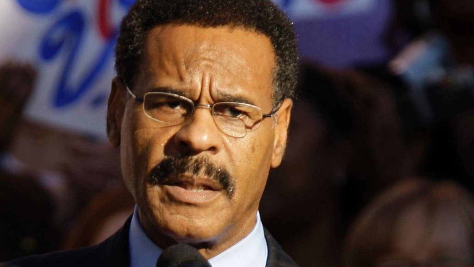 FILE - In this Oct. 1, 2008 file photo Missouri Democratic U.S. Rep. Emanuel Cleaver speaks at a rally in Kansas City, Mo. Federal investigators are looking into what appears to have been an early morning attempt Thursday, Sept. 11, 2014 to firebomb Cleaver's Missouri office. Police say two bottles, with paper towels sticking out of the necks extinguished during flight, were found shattered inside the office below a broken window. There were no staff members in the building at the time. (AP Photo/Charlie Riedel, File)