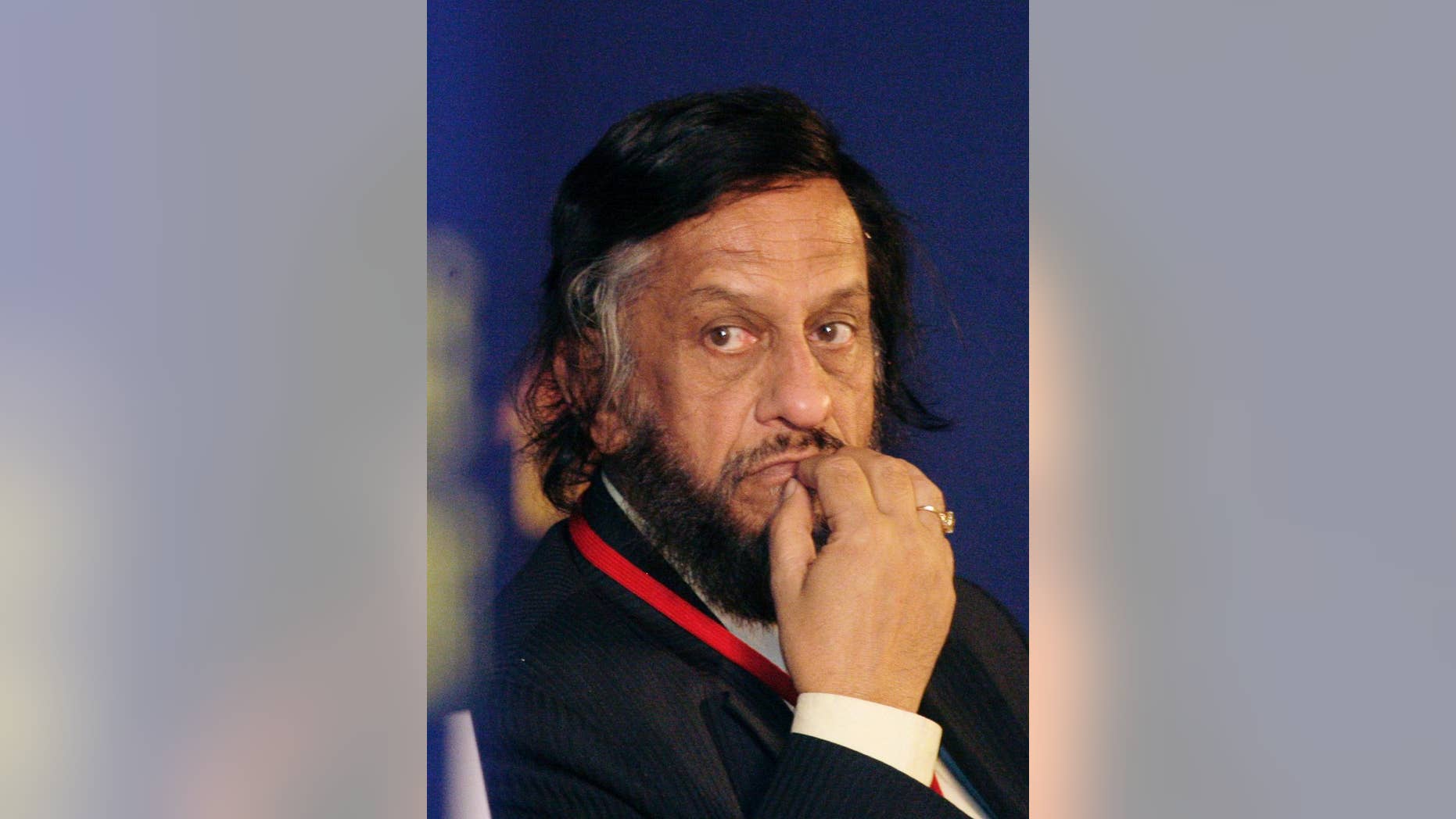 In this Feb. 6, 2010 file photo, Intergovernmental Panel on Climate Change Chairman Rajendra Pachauri listens to a speaker at the Delhi Sustainable Development Summit in New Delhi, India.