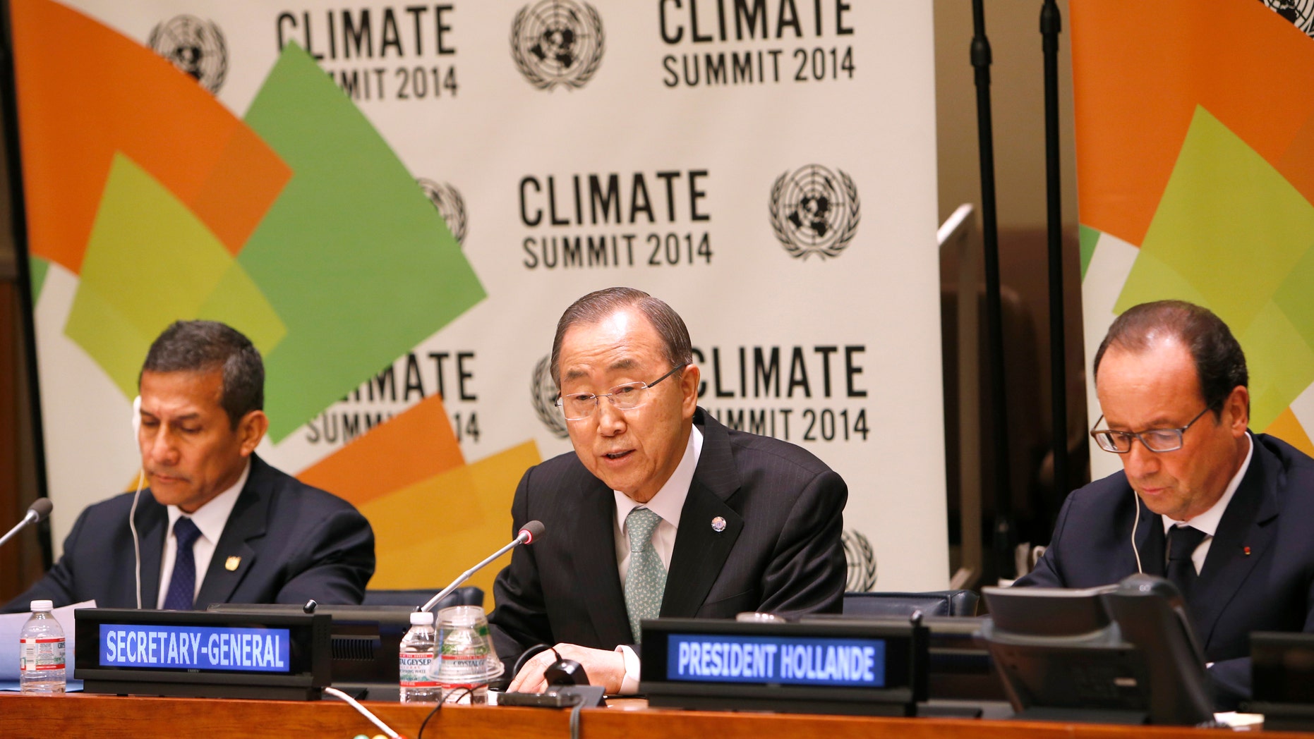 U.N. Secretary-General Ban Ki-moon, center, is joined by President Ollanta Humala of Peru, left, and President Francois Hollande of France at a news conference on climate change.