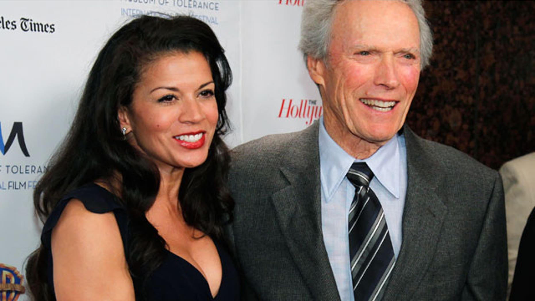 Nov. 14: Director Clint Eastwood (R) and his wife Dina Ruiz Eastwood arrive at the Museum of Tolerance International Film Festival gala awards presentation in his honor in Los Angeles. (Reuters)