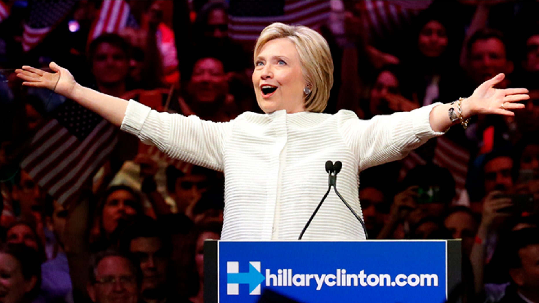 Democratic presidential candidate Hillary Clinton gestures as she greets supporters at a presidential primary election night rally, Tuesday, June 7, 2016, in New York. (AP Photo/Julio Cortez)