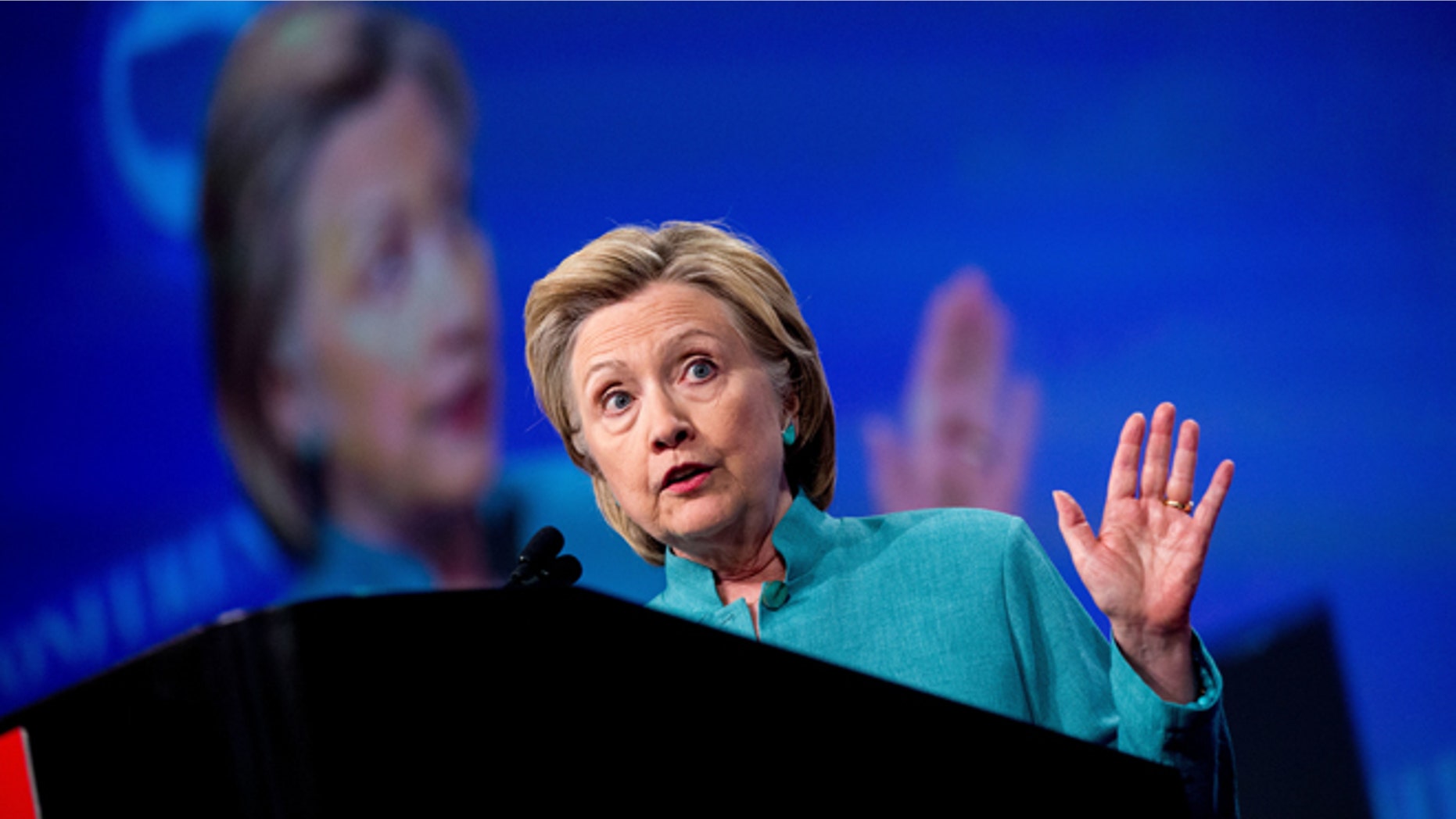 Democratic presidential candidate Hillary Clinton speaks at the U.S. Conference of Mayors in Indianapolis, Sunday, June 26, 2016, on the United Kingdom's vote to leave the European Union, America's economy, and other issues. (AP Photo/Andrew Harnik)