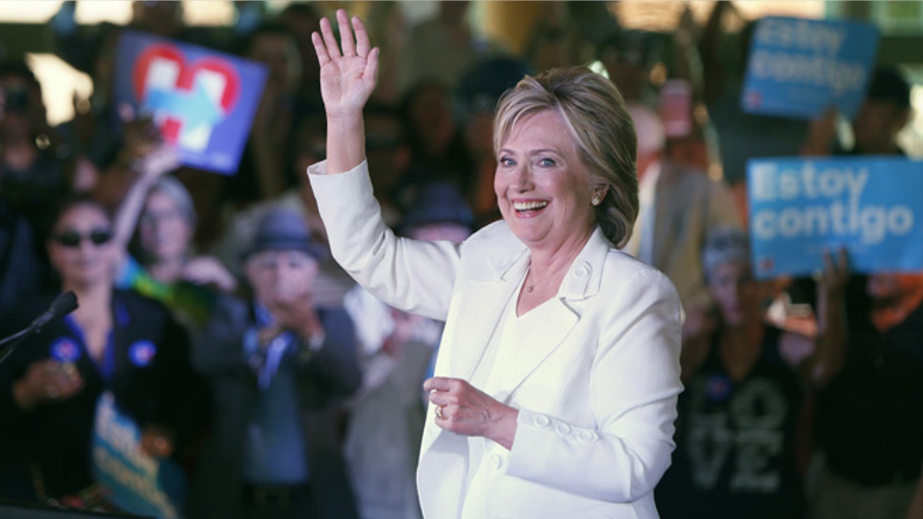 SAN ANTONIO, TX - OCTOBER 15: Democratic U.S. presidential hopeful Hillary Clinton acknowledges supporters at a "Latinos for Hillary" grassroots event October 15, 2015 in San Antonio, Texas. The event was part of the campaign's ongoing effort to build an organization outside of the four early states and work hard for every vote. (Photo by Erich Schlegel/Getty Images)