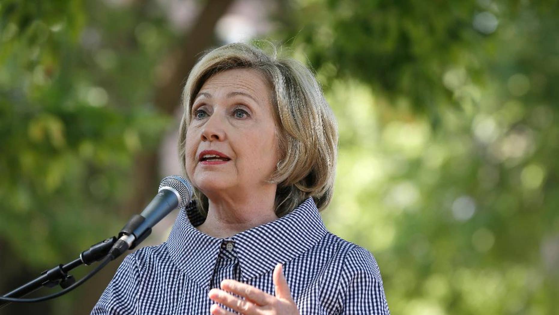 FILE - In this Aug. 15, 2015 file photo, Democratic presidential candidate Hillary Rodham Clinton speaks at the Iowa State Fair in Des Moines, Iowa. The State Department review of Clinton's emails so far has found as many as 305 messages that could contain classified information and require further review by federal agencies, the department said Monday. (AP Photo/Charlie Neibergall, File)