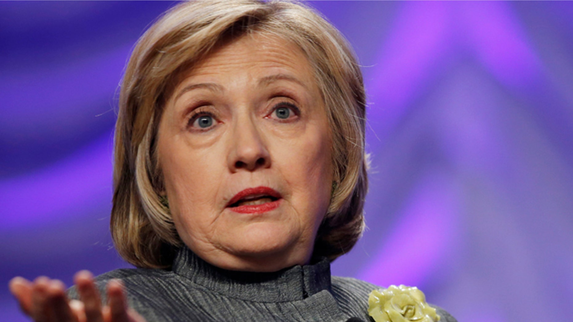 FILE -This May 6, 2014 file photo shows Former Secretary of State Hillary Rodham Clinton speaking in National Harbor, Md. To congressional Republicans, "Benghazi" is shorthand for incompetence and cover-up. Democrats hear it as the hollow sound of pointless investigations. It is, in fact, a Mediterranean port city in Libya that was the site of an attack on an American diplomatic compound on the 11th anniversary of 9/11 that killed U.S. Ambassador Chris Stevens and three other Americans. That's nearly all that U.S. politicians can agree on about Benghazi. (AP Photo/Charles Dharapak, File)