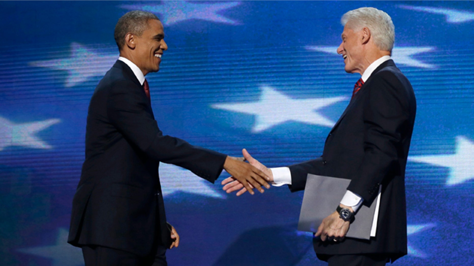 Sept. 5, 2012: President Barack Obama shakes hands with Former President Bill Clinton during the Democratic National Convention in Charlotte, N.C.