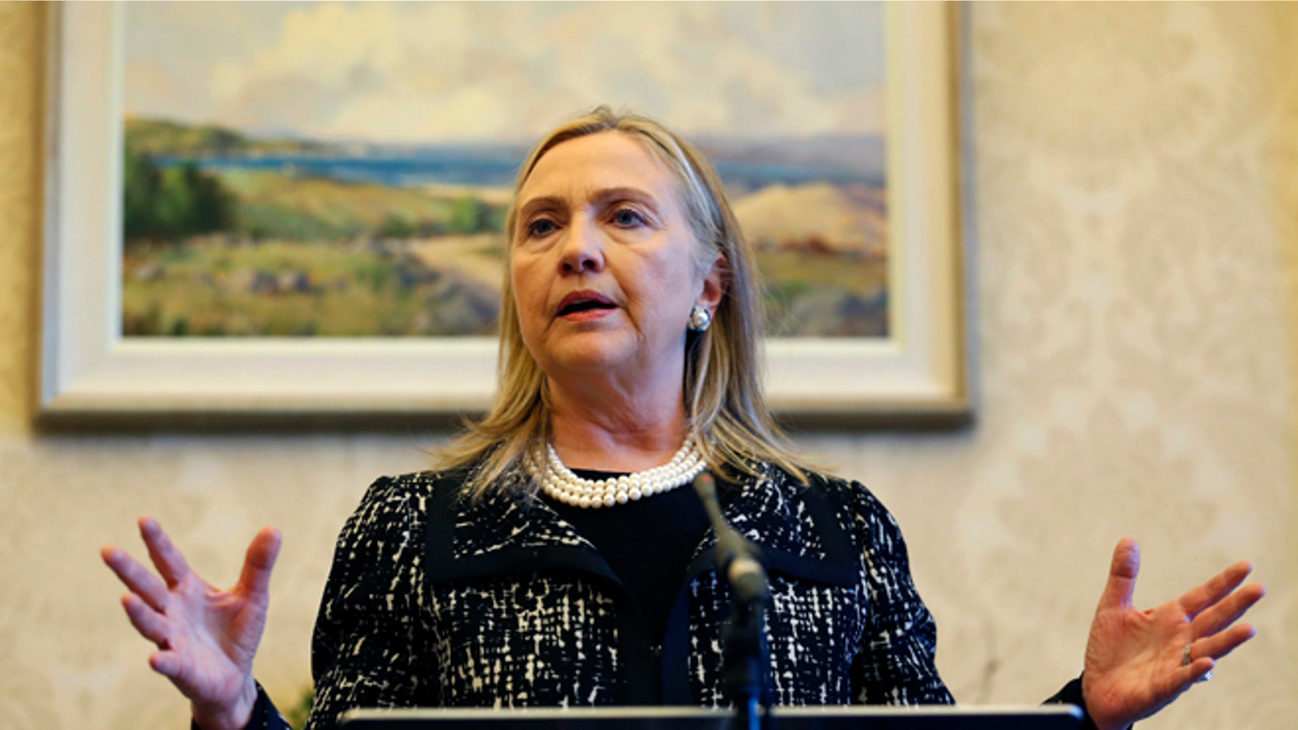 FILE: Dec. 7, 2012: Secretary of State Hillary Clinton at a news conference at Stormont Castle in Belfast, Northern Ireland.