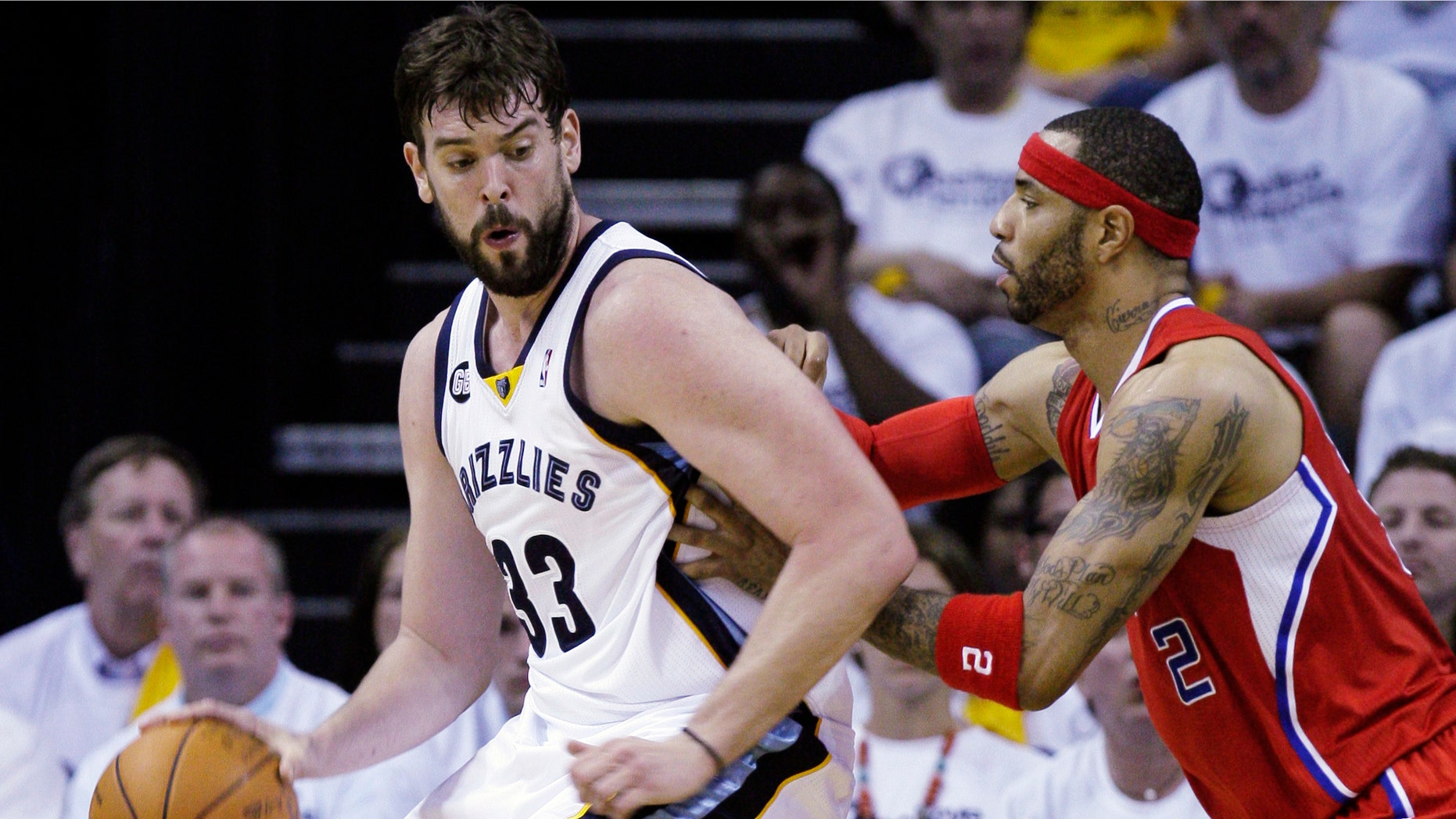 Memphis Grizzlies' Marc Gasol (33), of Spain, is defended by Los Angeles Clippers' Kenyon Martin (2) during the first half in Game 1 of a first-round NBA basketball playoff series, Sunday, April 29, 2012, in Memphis, Tenn. (AP Photo/Danny Johnston)