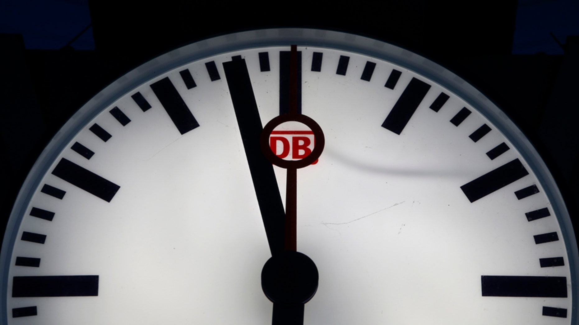File photo - Deutsche Bahn sign is seen in a clock at a train station in Munich, Germany May 5, 2015.