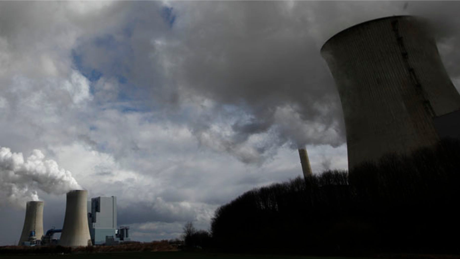 This file image shows steam rising from a coal power plant.