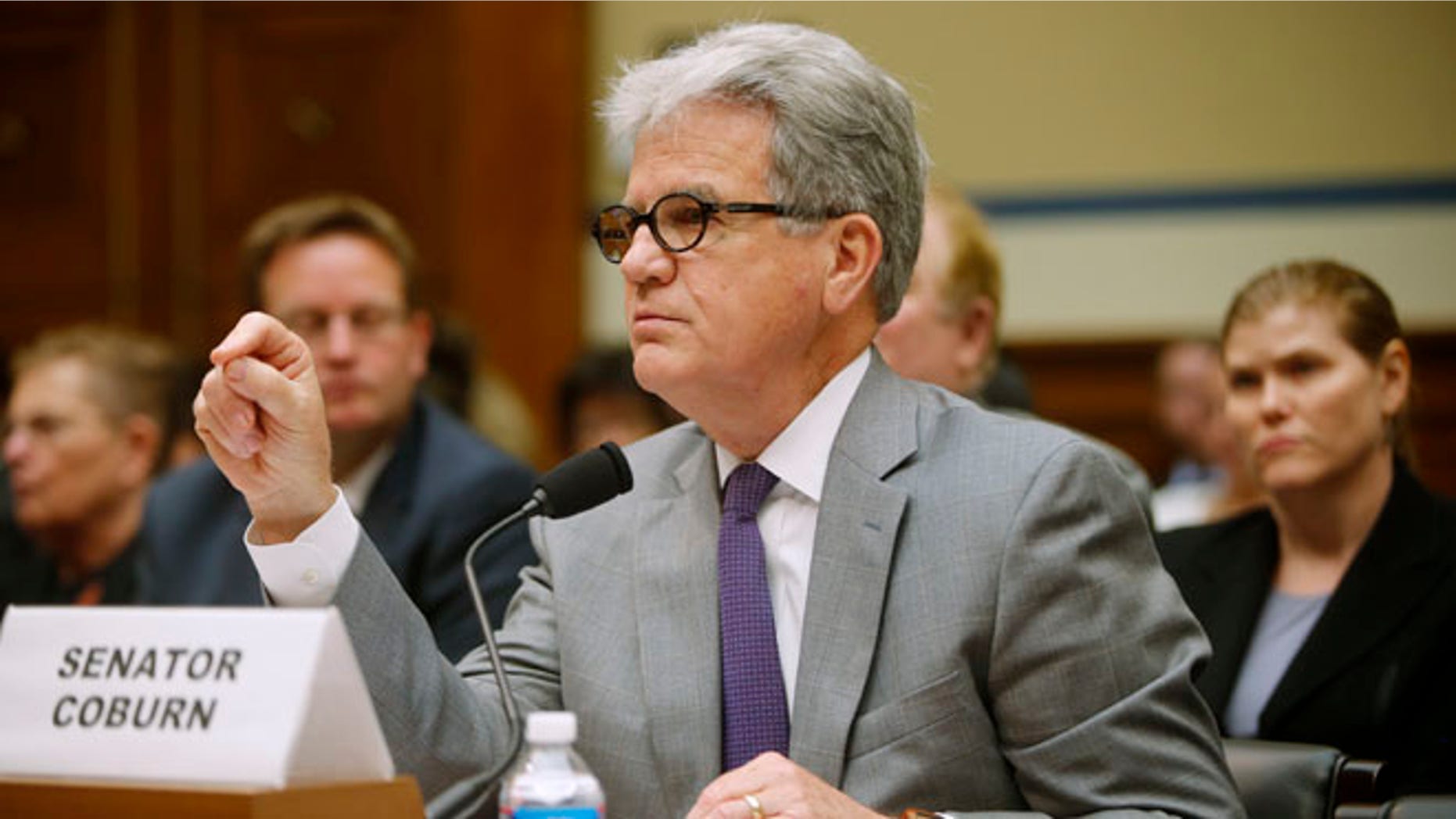 Sen. Tom Coburn, R-Okla. testifies on Capitol Hill in Washington, Tuesday, June 10, 2014, before the House Oversight and Government Reform Committee hearing regarding social security and disability benefits.