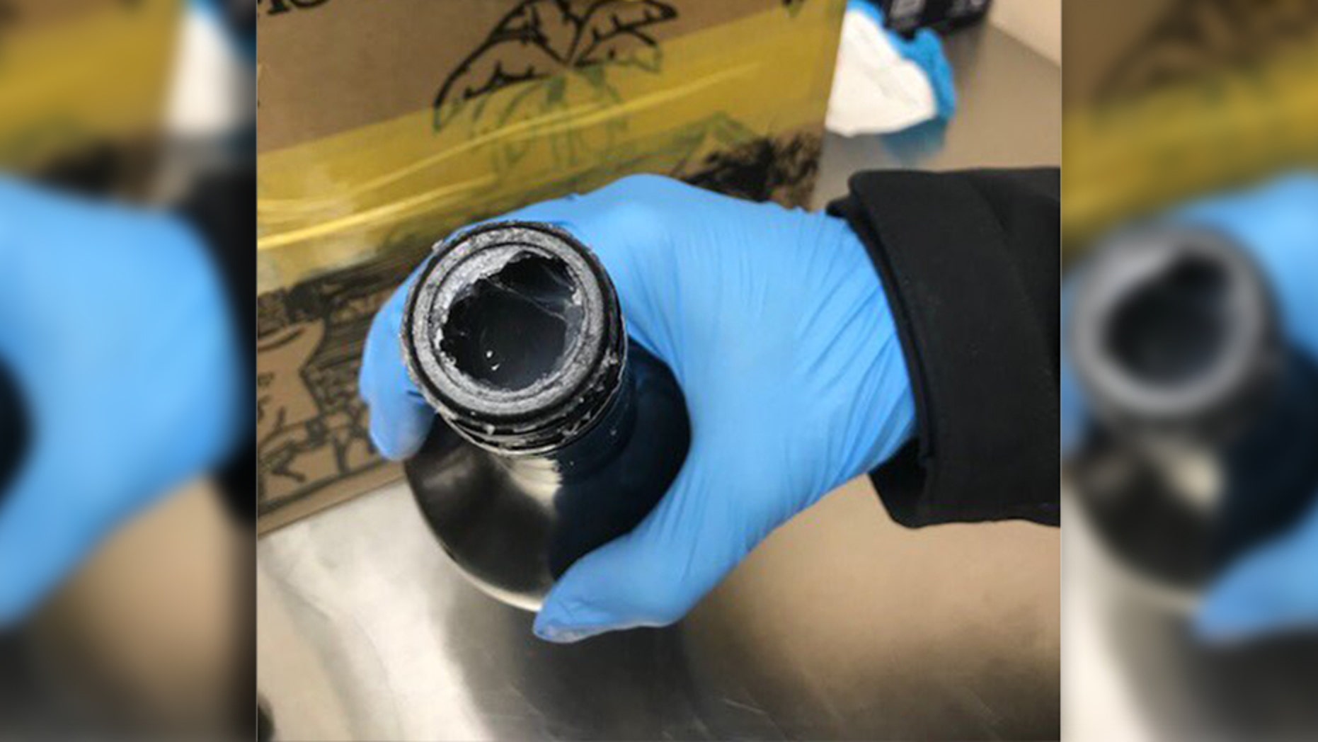 A woman from Jamaica allegedly tried to smuggle six pounds of cocaine into the United States in a liquor bottle.