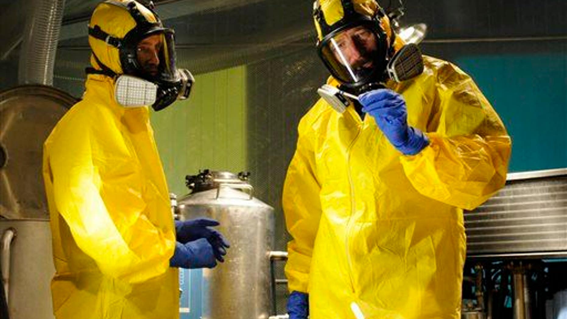 Jesse Pinkman, played by Aaron Paul, left, and Walter White, played by Bryan Cranston, cooking meth in a home being fumigated in the fifth season of "Breaking Bad."