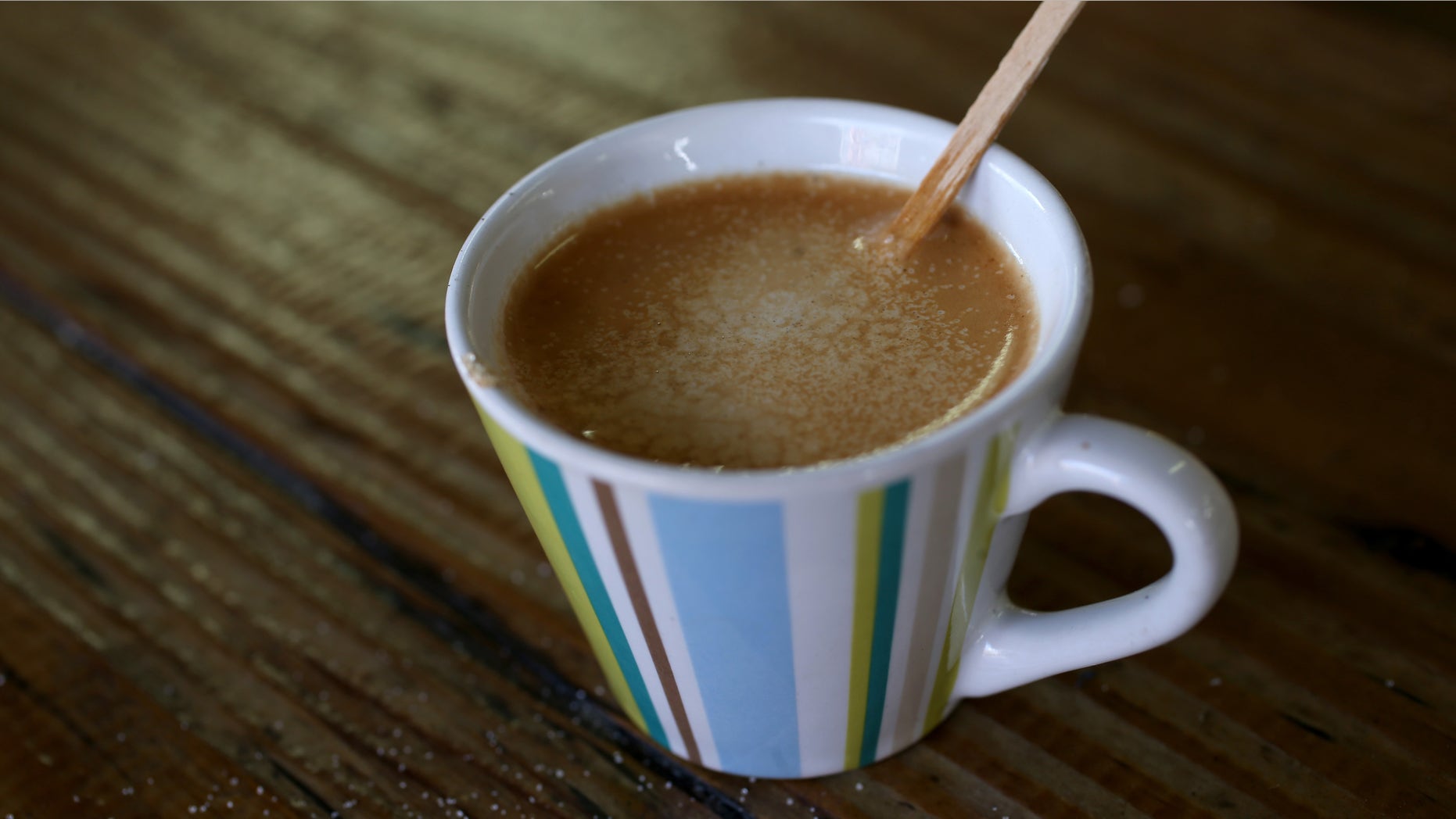 MIAMI, FL - MARCH 10: An expresso coffee sits on the counter at the Los Pinarenos Fruteria on March 10, 2015 in Miami, Florida. A panel of government-appointed scientists at the Dietary Guidelines Advisory Committee charged with proposing changes to U.S. dietary guidelines announced recently that three to five cups of coffee daily do not have long-term health risks, and help reduce the risk for heart disease and type 2 diabetes. (Photo by Joe Raedle/Getty Images)