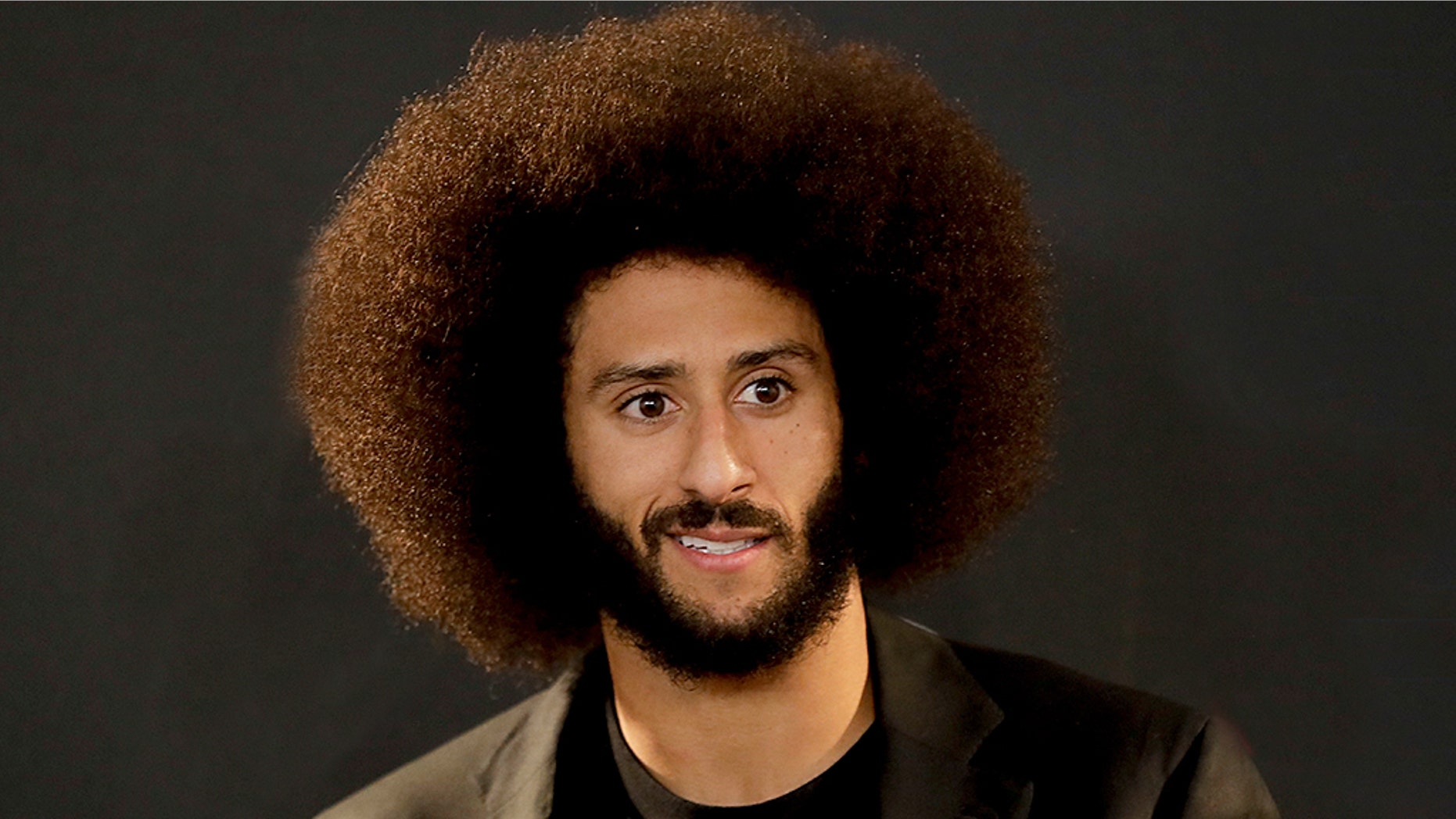 Colin Kaepernick received The National Education Association's President's Award for his "social justice activism" on Sunday.