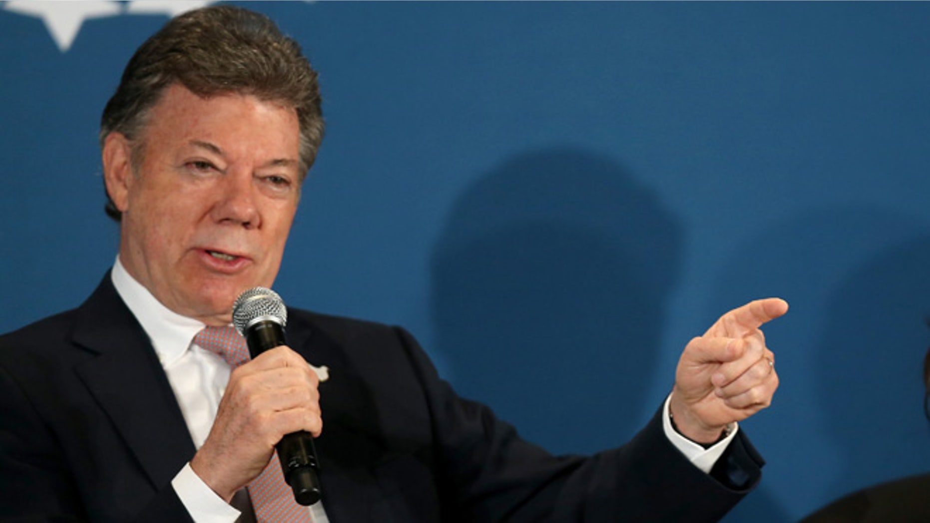 CORAL GABLES, FL - DECEMBER 11: Juan Manuel Santos, President of the Republic of Colombia, (L) and Susan Fonseca, Founder/CEO Woman@TheFrontier and Founding Member, Singularity University attend the Clinton Foundations Future of the Americas summit at the University of Miami on December 11, 2014 in Coral Gables, Florida. The summit is bringing together leaders from the private, public, and civic sectors across Latin America, the Caribbean, Canada, and the United States to work on economic prosperity, investment, and innovation opportunities across the Western Hemisphere. (Photo by Joe Raedle/Getty Images)