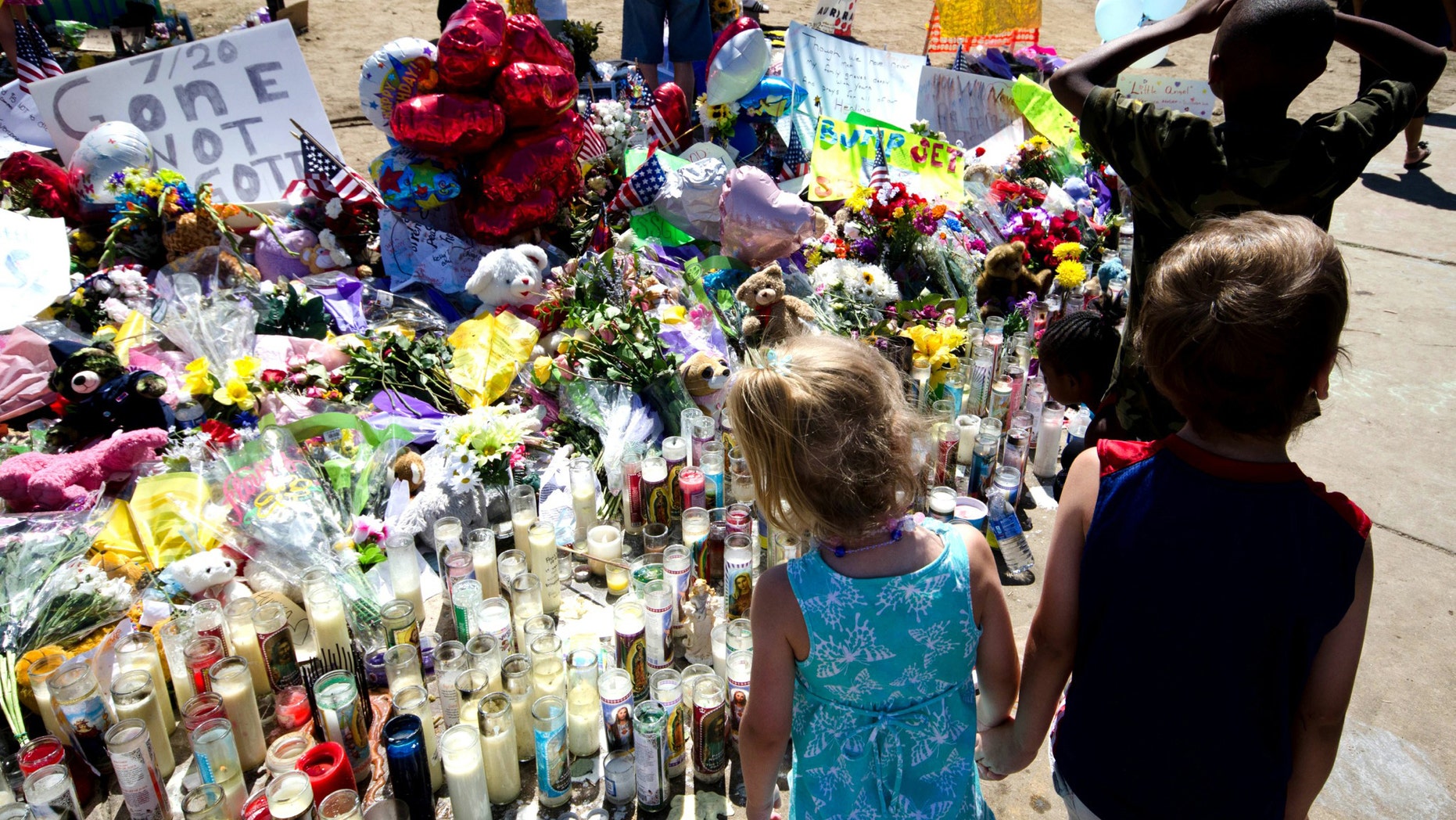 Across the street from the movie theater is a memorial for the victims of the shootings in Aurora, Colorado.