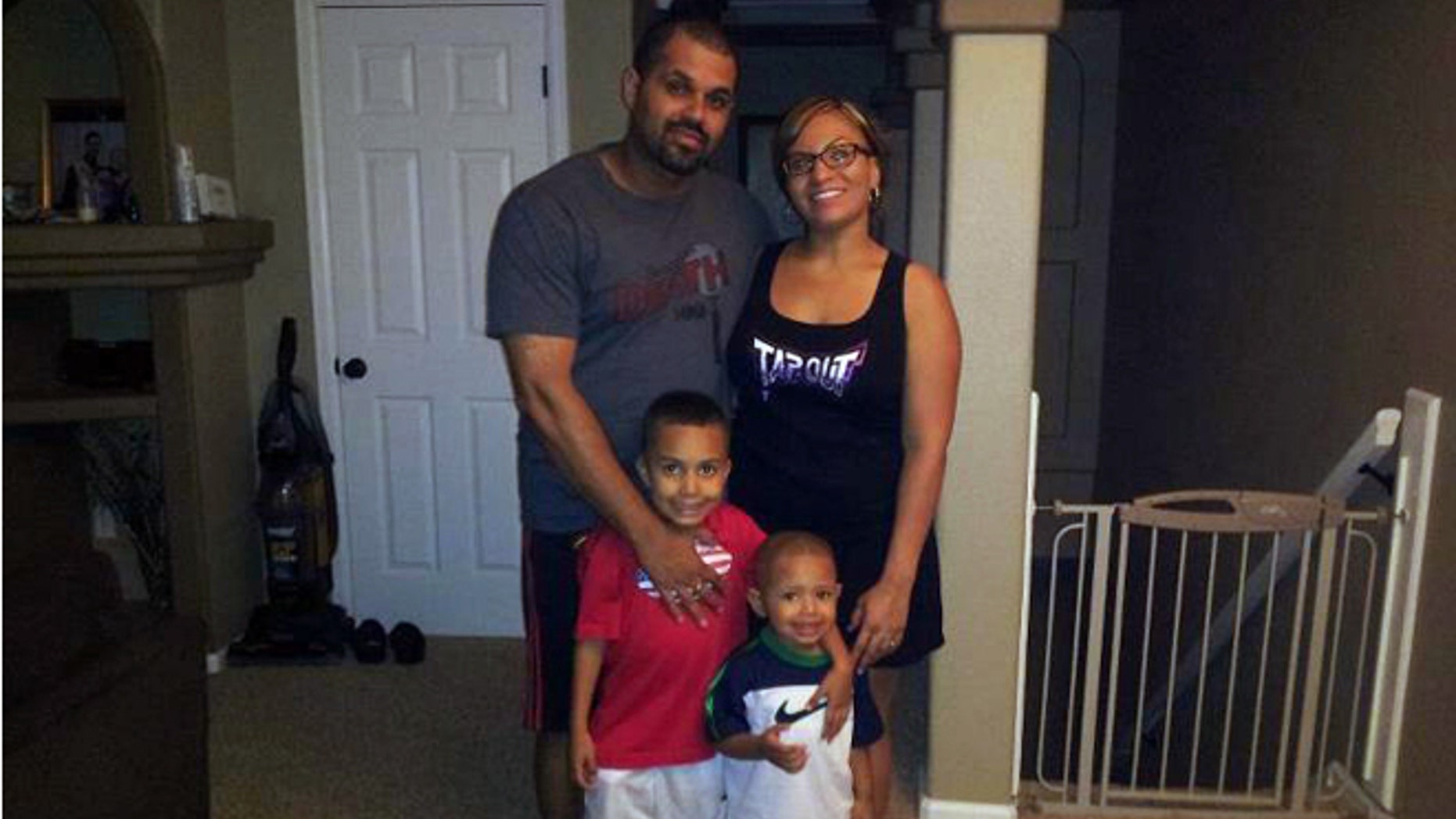 Rene Lima Marin with his wife Jasmine and children Justus, 7, and Josiah, 4, at their home in Aurora, Colo.