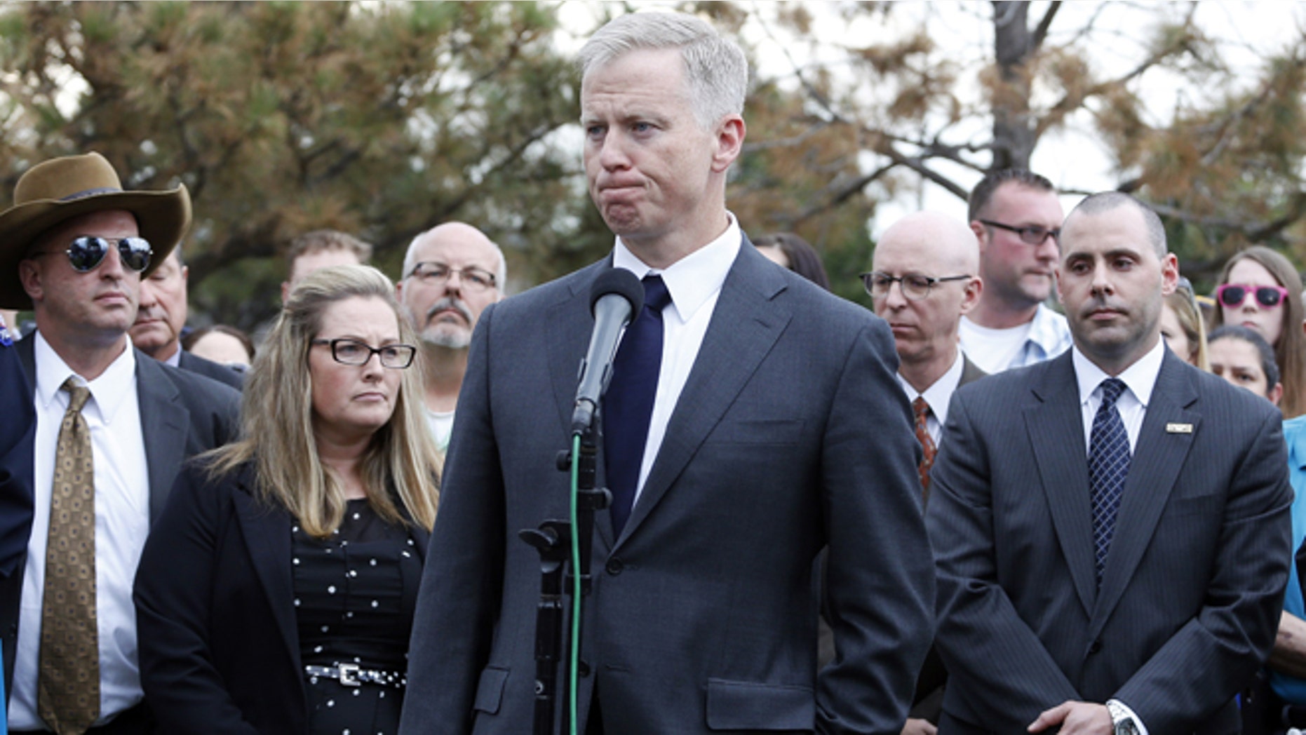 District Attorney George Brauchler speaks with members of the media following the reading of the jury's decision for Colorado theater shooter James Holmes, outside the Arapahoe County District Court. (AP Photo/Brennan Linsley)