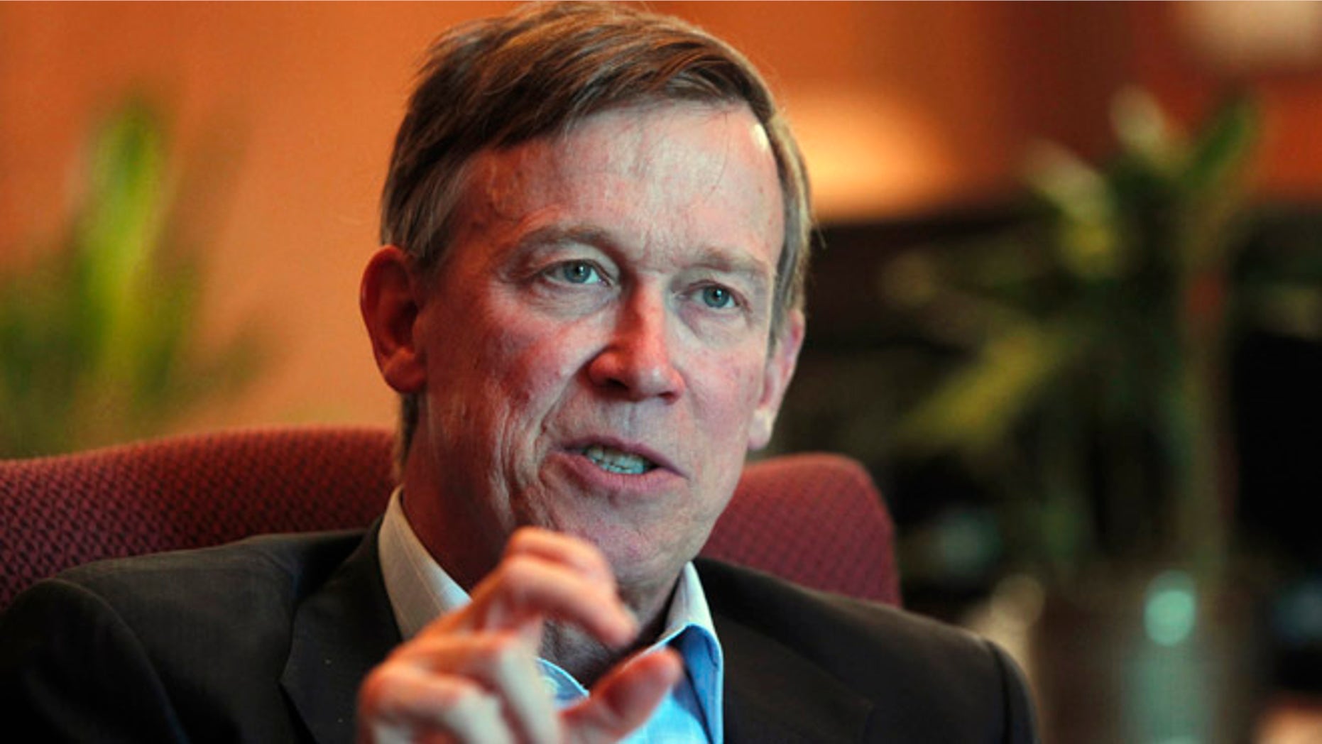 Dec. 12, 2012: In this file photo, Colorado Gov. John Hickenlooper is pictured during an interview with the Associated Press at his office in the Capitol in Denver.