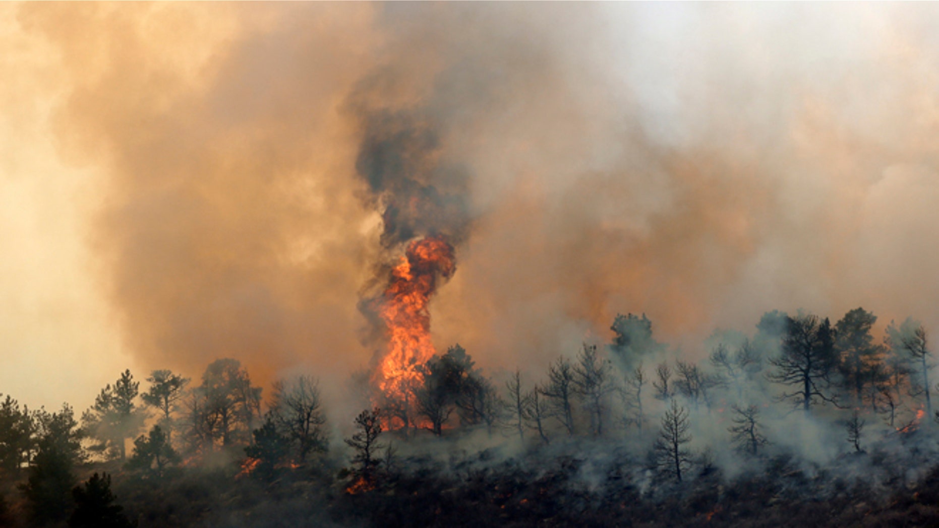 March 15, 2013: A wildfire burns out of control at Horsetooth Reservoir west of Fort Collins, Colo.