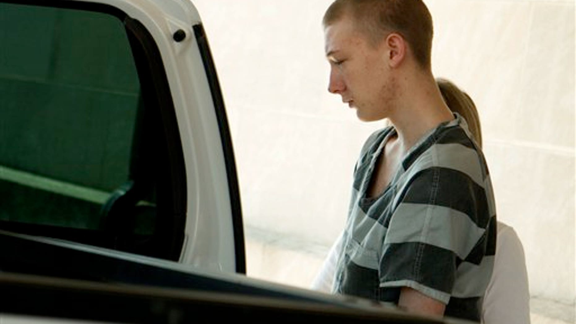 June 6, 2012: Colton Harvey leaves the Pope County Courthouse in Russellville.