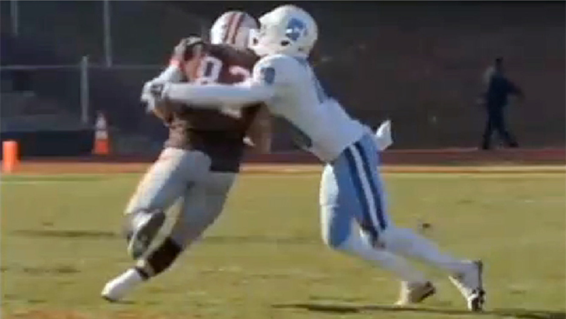 This undated photo shows an unidentified Columbia football player tackling an opponent.