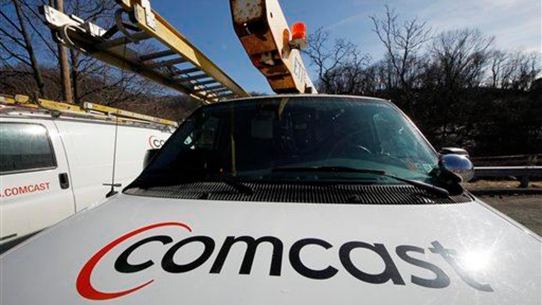 The Comcast logo is seen on a Comcast installation truck in Pittsburgh.