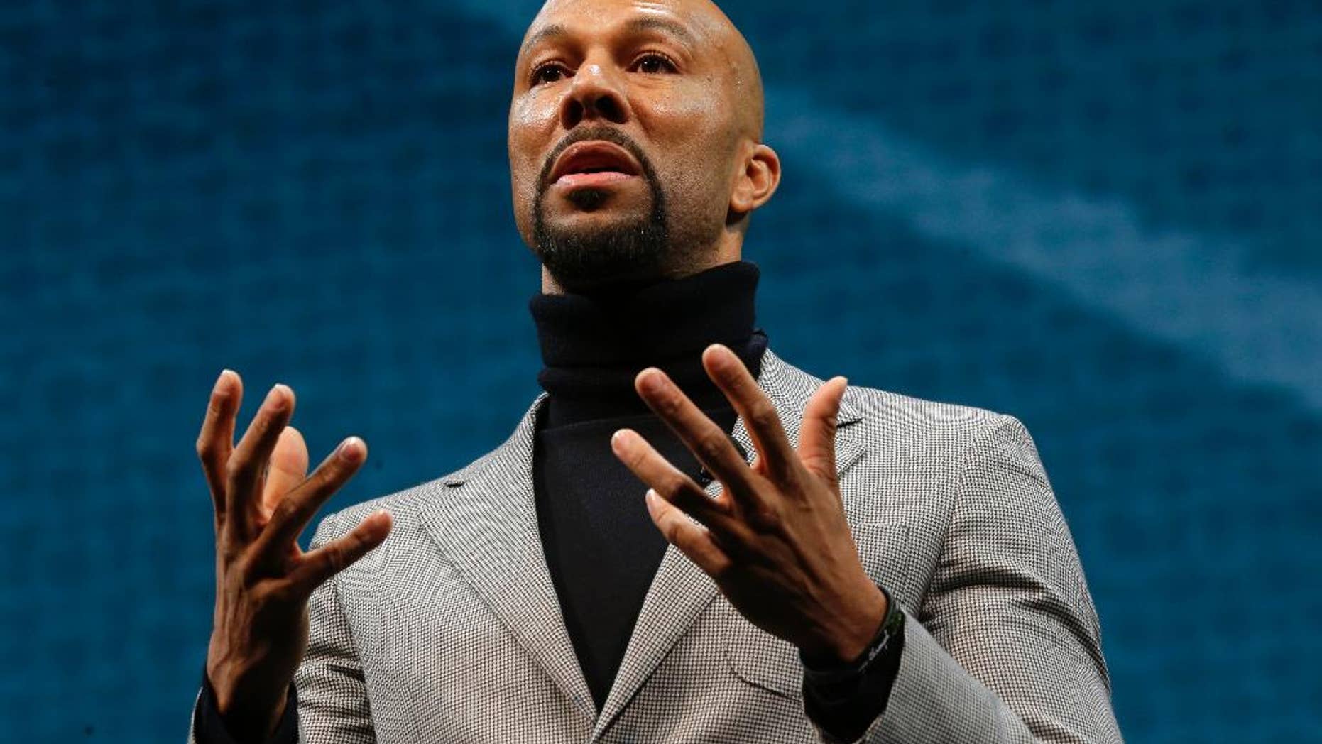 FILE - In this Wednesday, March 18, 2015, file photo, singer and actor Lonnie Rashid Lynn, better known by his stage name Common, speaks at Starbucks Coffee Company's annual shareholders meeting in Seattle. New Jersey’s Kean University has canceled hip-hop artist Common as commencement speaker after police voiced concerns over a song about a convicted cop killer who fled to Cuba. (AP Photo/Ted S. Warren, File)