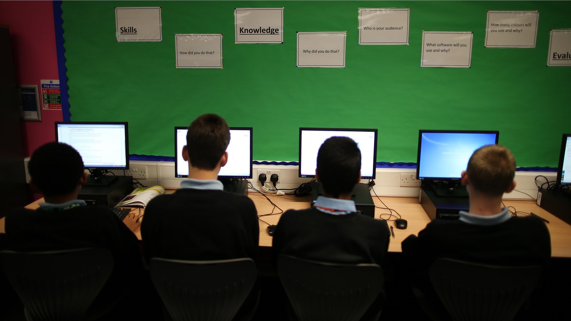 LONDON, ENGLAND - DECEMBER 01: Students work at computers during a lesson at a secondary school on December 1, 2014 in London, England. Education funding is expected to be an issue in the general election in 2015. (Photo by Peter Macdiarmid/Getty Images)