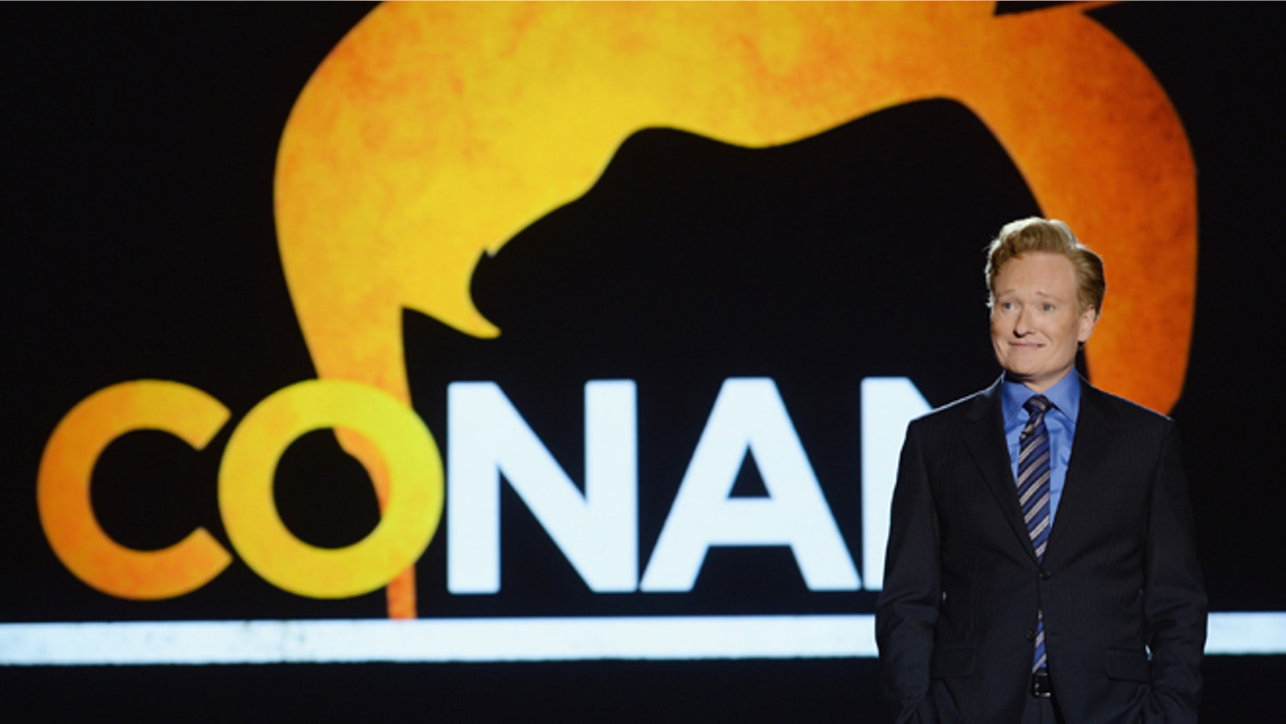 NEW YORK, NY - MAY 14: Conan O'Brien speaks onstage at the TBS / TNT Upfront 2014 at The Theater at Madison Square Garden on May 14, 2014 in New York City. 24674_002_1225.JPG (Photo by Dimitrios Kambouris/Getty Images for Turner)