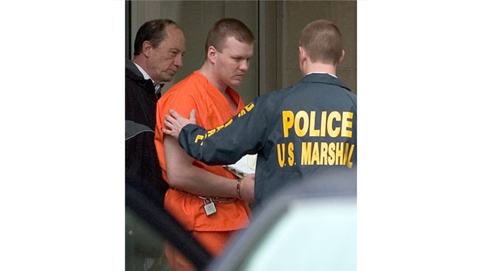 FILE - In a Tuesday, April 12, 2005 file photo, Chadrick Fulks is escorted by U.S. Marshals out of the federal courthouse in Huntington, W.Va., following his arraignment on charges if carjacking resulting in the death of Marshall University student Samantha Burns, felon in possession of a firearm, possession of stolen firearms and interstate transportation of a stolen motor vehicle. (AP Photo)