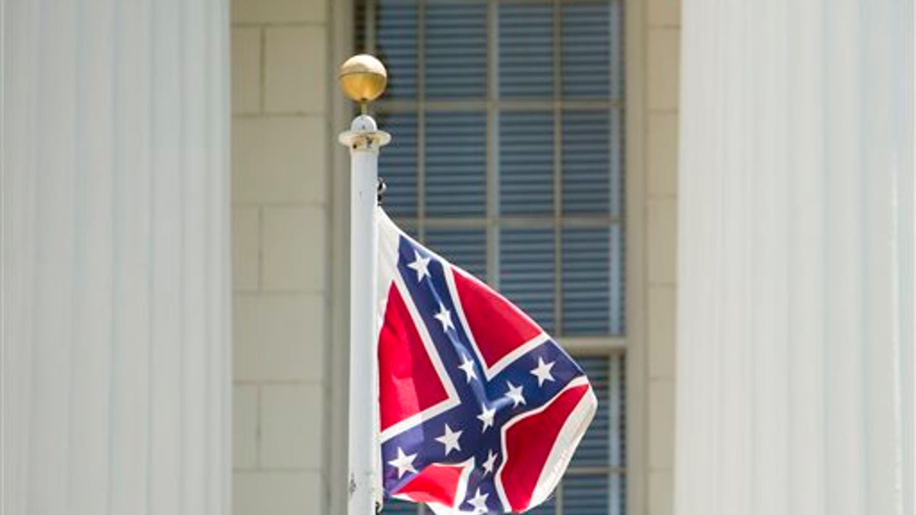 June 22: A Confederate flag flies on the grounds of the Alabama Capitol building in Montgomery, Ala.