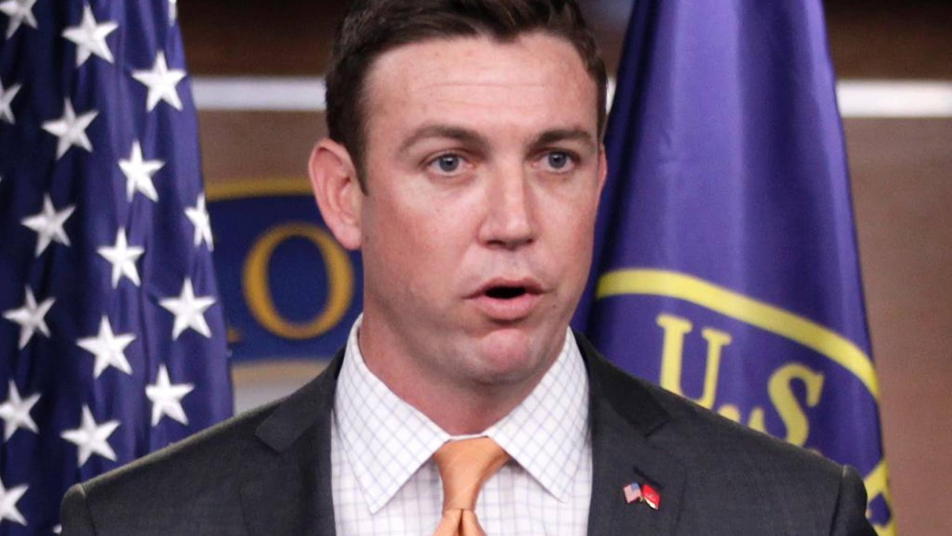FILE - In this April 7, 2011 file photo, Rep. Duncan Hunter, R-Calif., speaks during a news conference on Capitol Hill in Washington. Hunter said he will introduce a bill on March 19, 2015, that calls on the president to task one person to lead U.S. efforts to recover American hostages. (AP Photo/Carolyn Kaster, File)