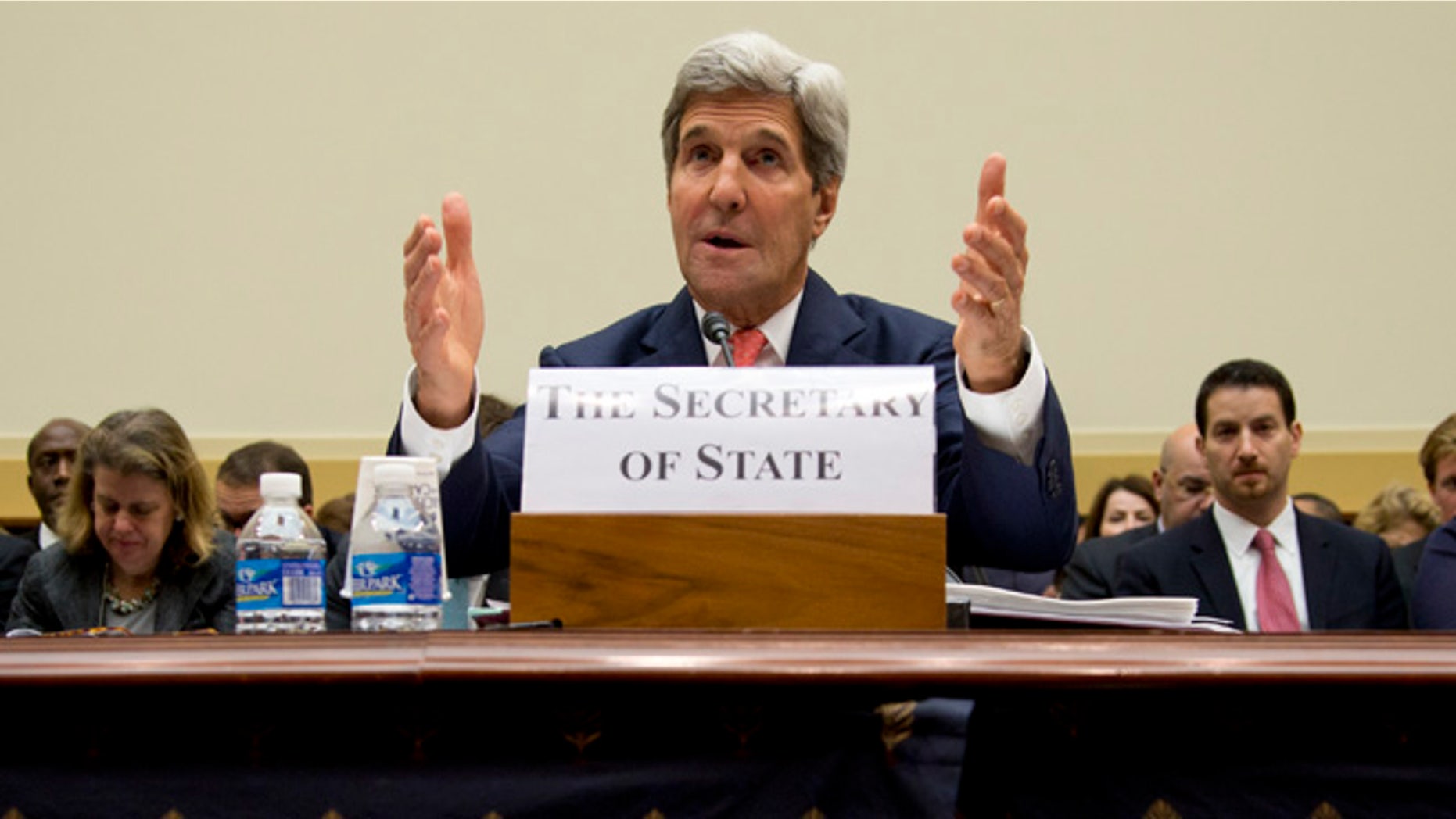 In this Thursday, Sept. 18, 2014 photo, Secretary of State John Kerry testifies on Capitol Hill in Washington during a House Foreign Affairs Committee hearing.