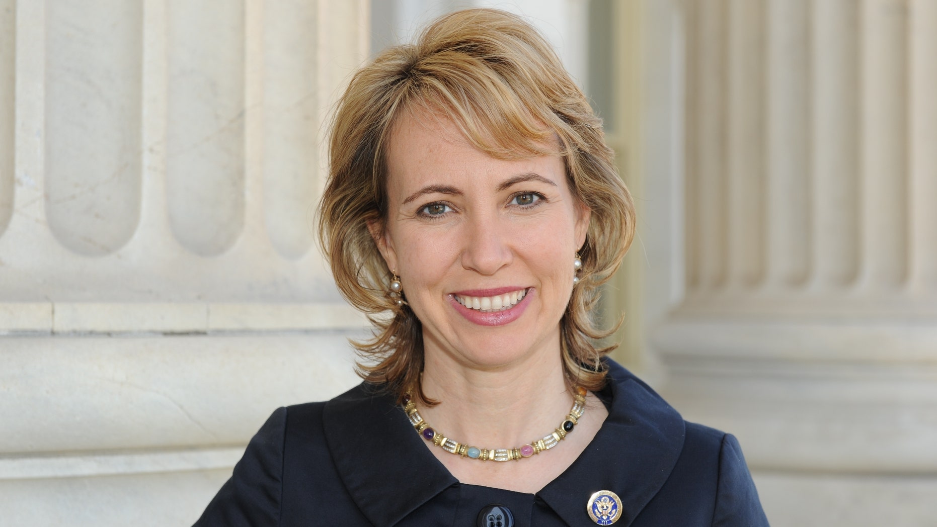 In this March, 2010 file photo, Rep. Gabrielle Giffords, Giffords poses for a photo. Giffords was critically wounded during a shooting at a political event Jan. 8 in Tucson, Ariz.