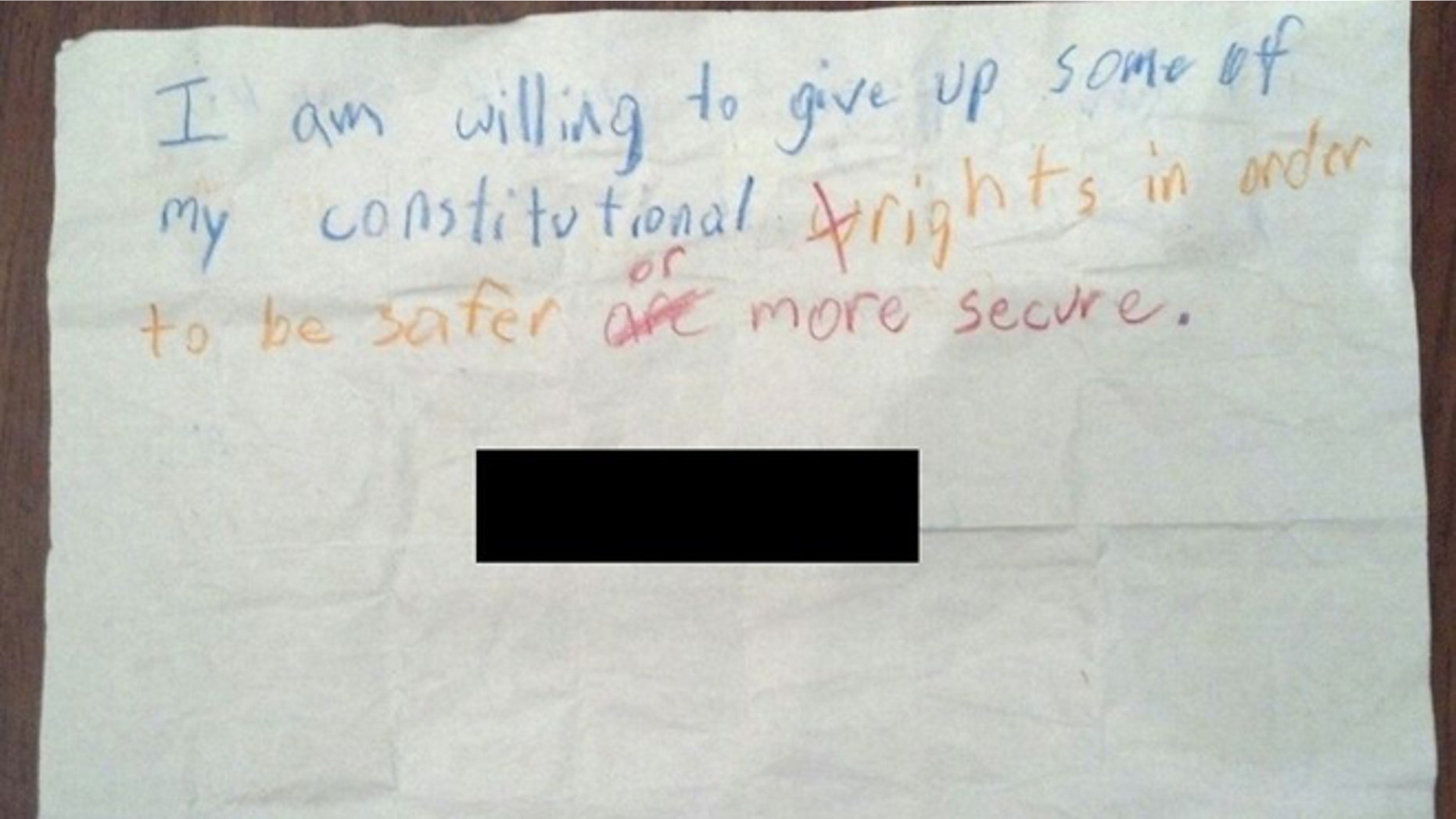 Aaron Harvey says his son's 4th grade teacher told the boy to write the letter pictured above.