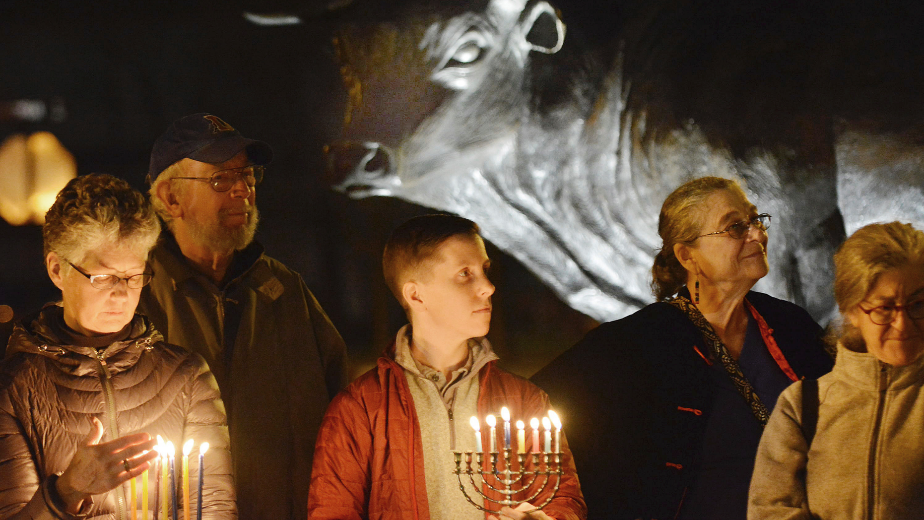 In this Dec. 11, 2015 file photo, people participate in a Jewish Voice for Peace gathering on Hanukkah to challenge Islamophobia and fight against racism, in Durham, N.C.