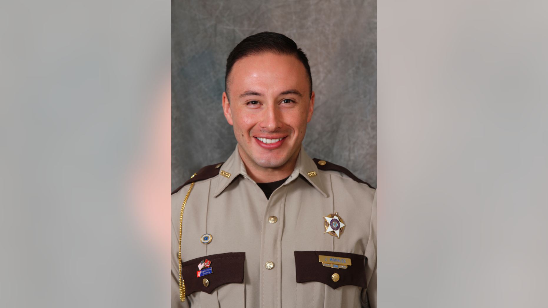Scott County Deputy Jaime Morales is seen in an undated photo provided by the Scott County Sheriff's Office. A Florida bank robbery suspect tracked down at an interstate rest stop in Kentucky late Tuesday was killed in a late-night exchange of gunfire that left Morales critically wounded, authorities said Wednesday, Sept. 12, 2018. The fugitive, Edward Reynolds, died at the rest stop, Kentucky State Police Trooper Bernis Napier said. (Scott County Sheriff's Office via AP)