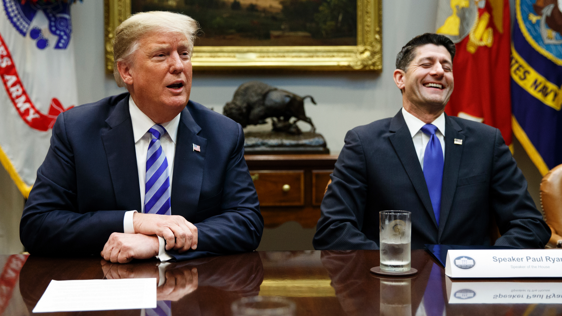 Speaker of the House Rep. Paul Ryan, R-Wis., laughs as he listens to President Donald Trump speak during a meeting with Republican lawmakers in the Roosevelt Room of the White House, Wednesday, Sept. 5, 2018, in Washington. (AP Photo/Evan Vucci)