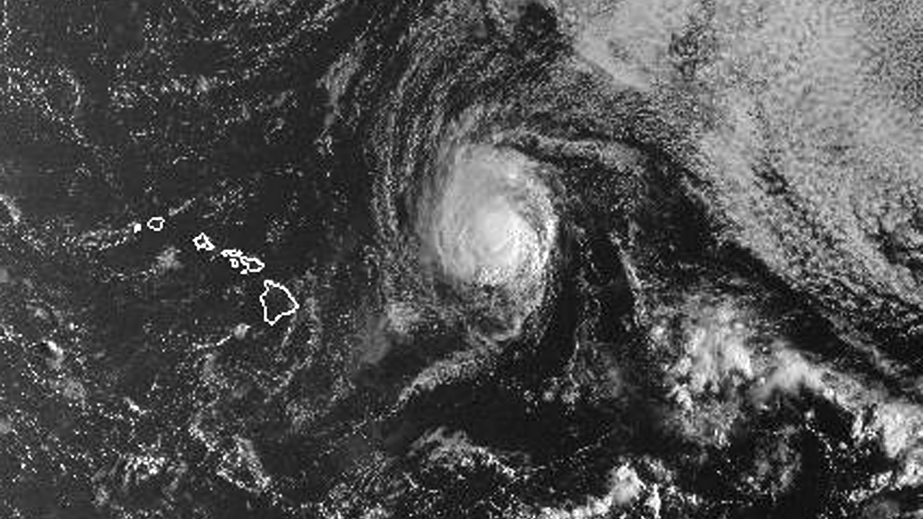 This satellite image from the National Oceanic and Atmospheric Administration shows Hurricane Olivia east of Hawaii at around 6:30 a.m. local time Monday, Sept. 10, 2018. Olivia is expected to approach Hawaii in the coming days as either a high-end tropical storm or a low-end hurricane. Central Pacific Hurricane Center meteorologist Maureen Ballard said Monday there's only a slight difference between the two, so people should prepare as though it will be a hurricane. Olivia is currently 435 miles (700 kilometers) east of Hilo and moving 9 mph (15 kph). It has maximum sustained winds of 75 mph (120 kph). (NOAA via AP)