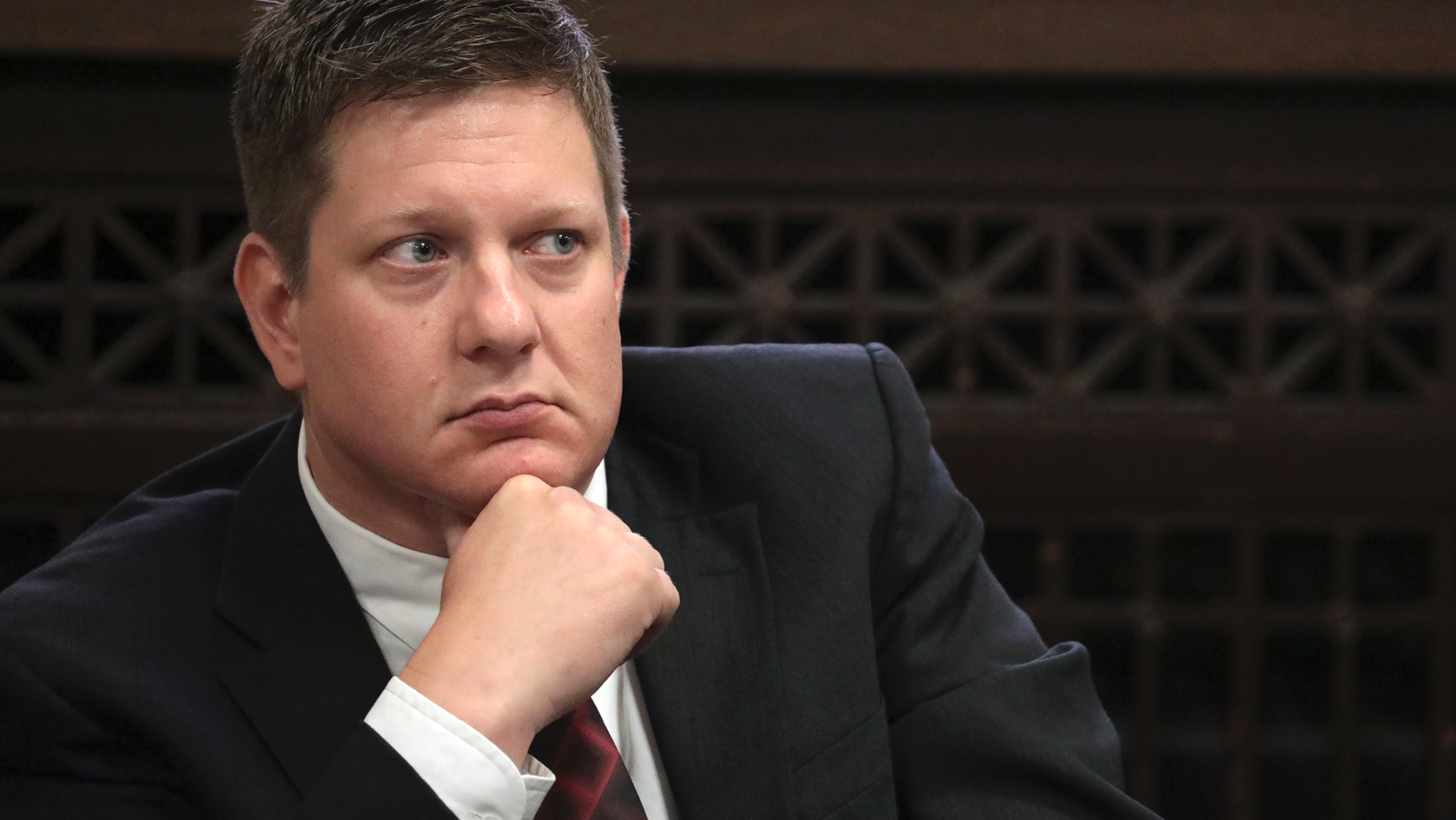 FILE - In this Thursday, Sept. 6, 2018, file photo, Chicago police Officer Jason Van Dyke, charged with murder in the shooting of black teenager Laquan McDonald in 2014, listens during a hearing at the Leighton Criminal Court Building in Chicago. Attorneys are expected to start questioning possible jurors in Van Dyke's trial on Monday, Sept. 10, 2018. (Antonio Perez/Chicago Tribune via AP, Pool, File)