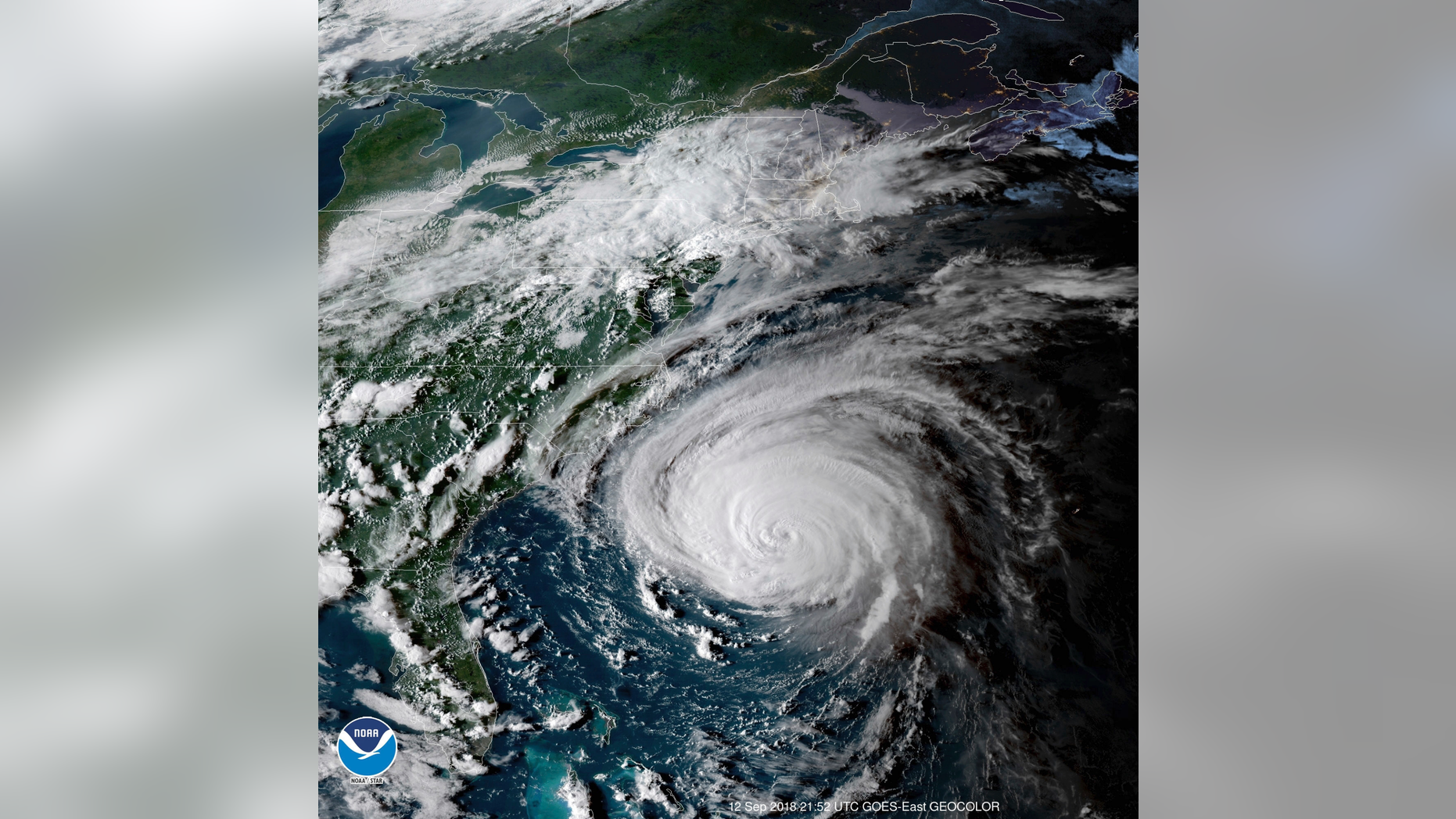 This enhanced satellite image made available by NOAA shows Hurricane Florence off the eastern coast of the United States on Wednesday, Sept. 12, 2018 at 5:52 p.m. EDT. (NOAA via AP)