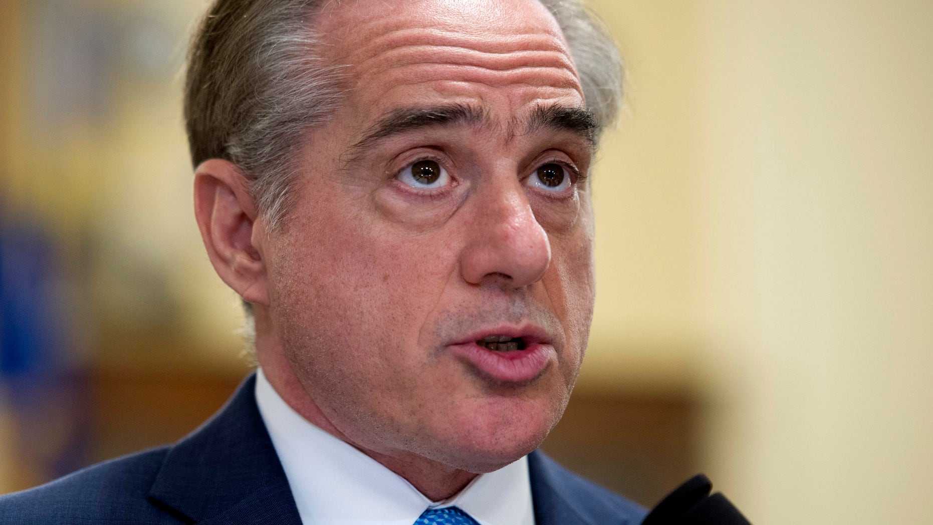 FILE - In this March 7, 2017, file photo, Secretary of Veterans Affairs David Shulkin, addresses a House Veterans' Affairs Committee's hearing on Capitol Hill in Washington. In a May 5 interview with the Associated Press, Shulkin said he thinks reducing the number of homeless veterans nationwide from roughly 40,000 to 10,000 or 15,000 is an "achievable goal" for the Trump administration. (AP Photo/Cliff Owen, File)
